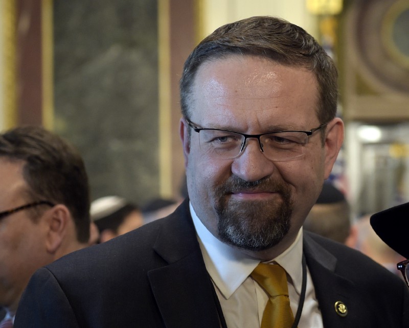 Deputy assistant to President Trump Sebastian Gorka talks with people in the Treaty Room in the Eisenhower Executive Office Building on the White House complex in Washington, Tuesday, May 2, 2017, during a ceremony commemorating Israeli Independence Day. CREDIT: AP Photo/Susan Walsh