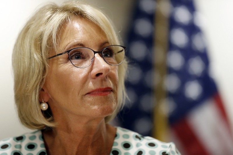 Education Secretary Betsy DeVos pauses while speaking with the media after a series of listening sessions about campus sexual violence, Thursday, July 13, 2017, in Washington. CREDIT: AP/Alex Brandon