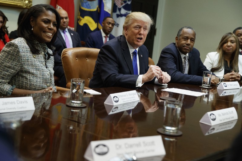 Housing and Urban Development official Lynne Patton, right, has close ties to the Trump family. CREDIT: AP Photo/Evan Vucci