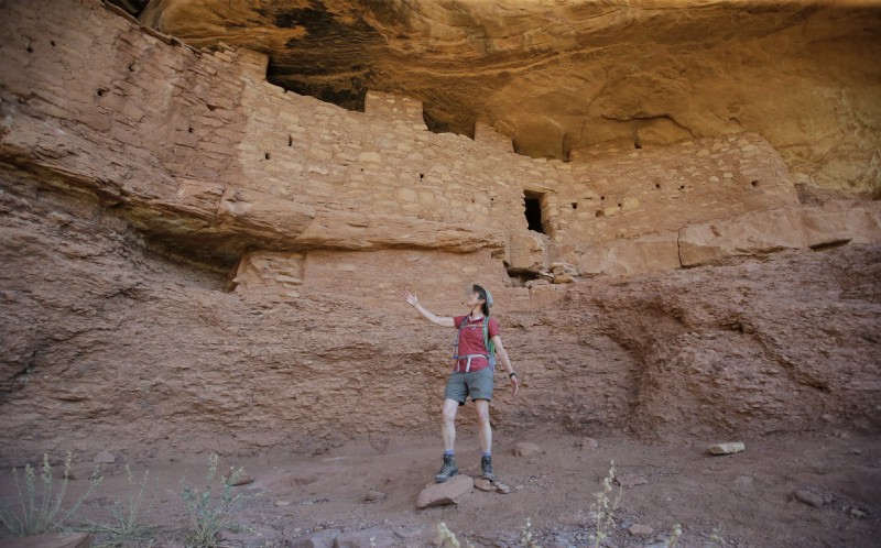 This July 15, 2016, file photo, then-Secretary Sally Jewell tours the “Moonhouse” in McLoyd Canyon in Bears Ears National Monument near Blanding, Utah. CREDIT: AP Photo/Rick Bowmer