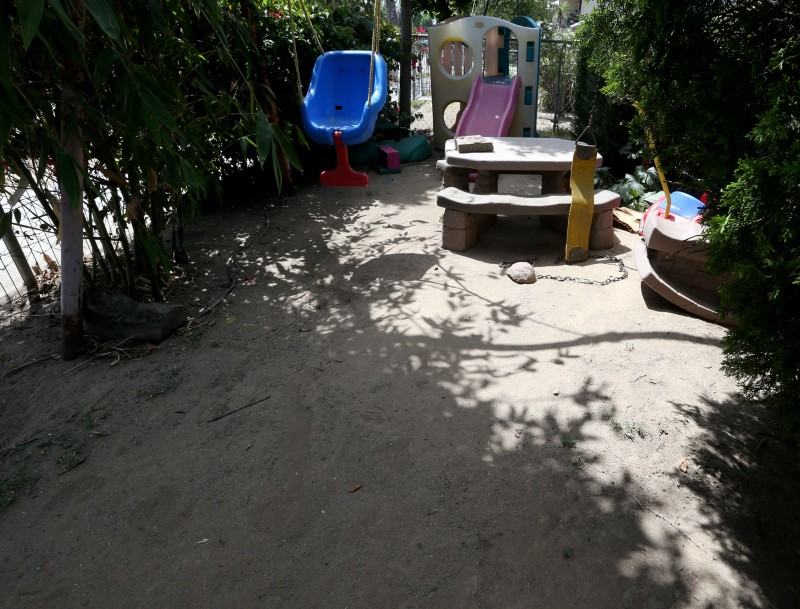 The soil around this swing set in an east Santa Ana yard tested above the residential lead soil level considered dangerous for children by the California Office of Environmental Health Hazard Assessment. CREDIT: Daniel A. Anderson for ThinkProgress
