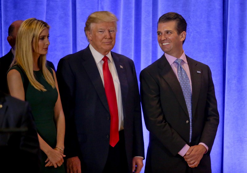 President-elect Donald Trump waits with family members Ivanka Trump, left, and Donald Trump Jr. before speaking at a news conference, Wednesday, Jan. 11, 2017, in New York. CREDIT: AP Photo/Seth Wenig