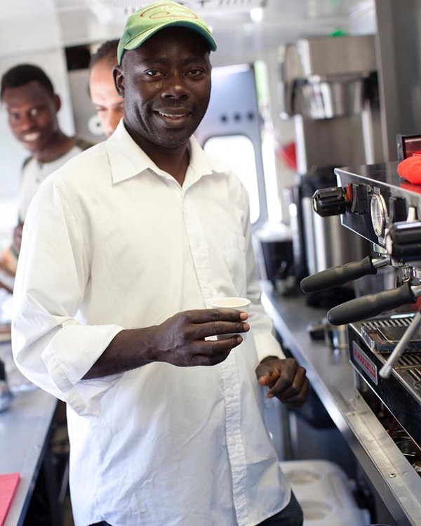 Leon Shombola works as a manager at Refuge Coffee. CREDIT: Refuge Coffee