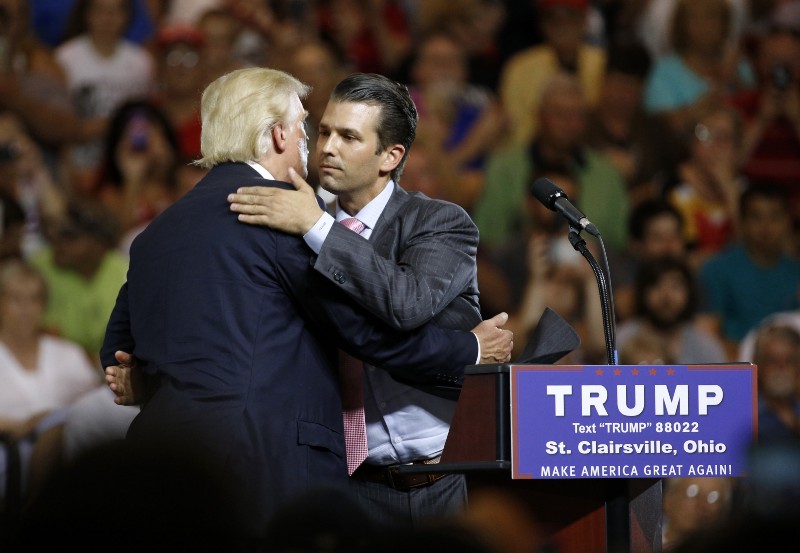 Republican presidential candidate Donald Trump, left, hugs his son Donald Trump Jr. during a rally at Ohio University Eastern Campus in St. Clairsville, Ohio, June 28, 2016. CREDIT: AP Photo/Patrick Semansky