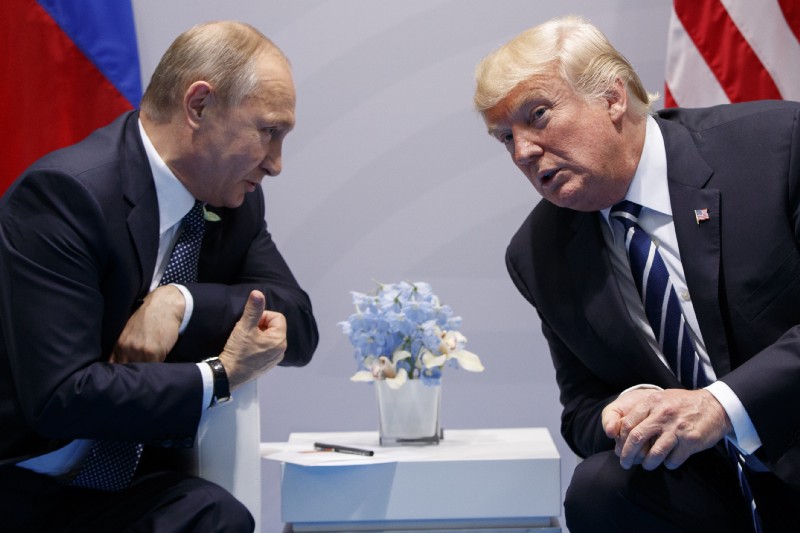 In this Friday, July 7, 2017, file photo U.S. President Donald Trump meets with Russian President Vladimir Putin at the G-20 Summit in Hamburg. CREDIT: AP Photo/Evan Vucci