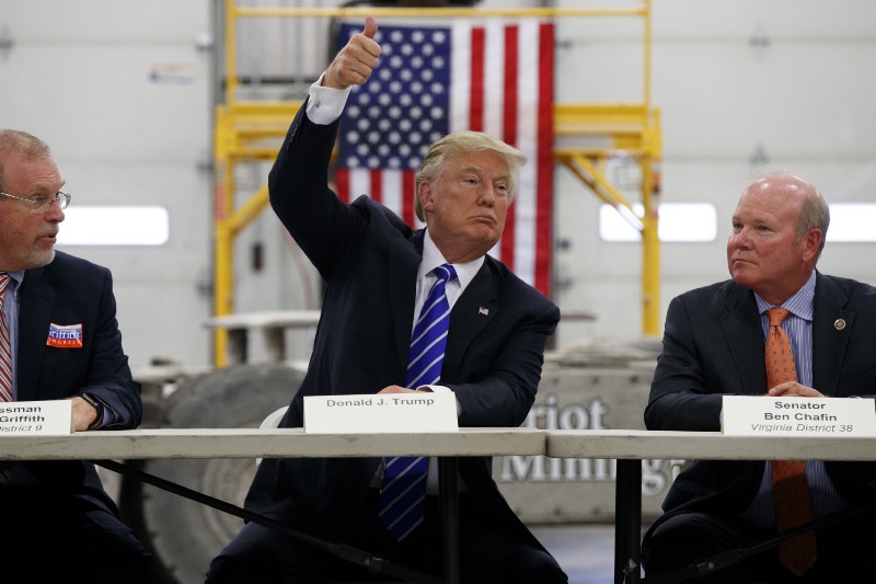 Rep. Morgan Griffith (R-VA) sits with then-candidate Donald Trump CREDIT: AP Photo/Evan Vucci