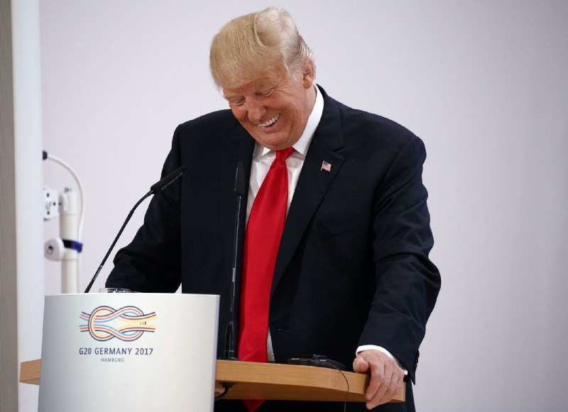 President Donald Trump laughs as he speaks to the Women’s Entrepreneurship Finance event at the G20 Summit, in Hamburg, Germany, Saturday, July 8, 2017. CREDIT: AP Photo/Evan Vucci