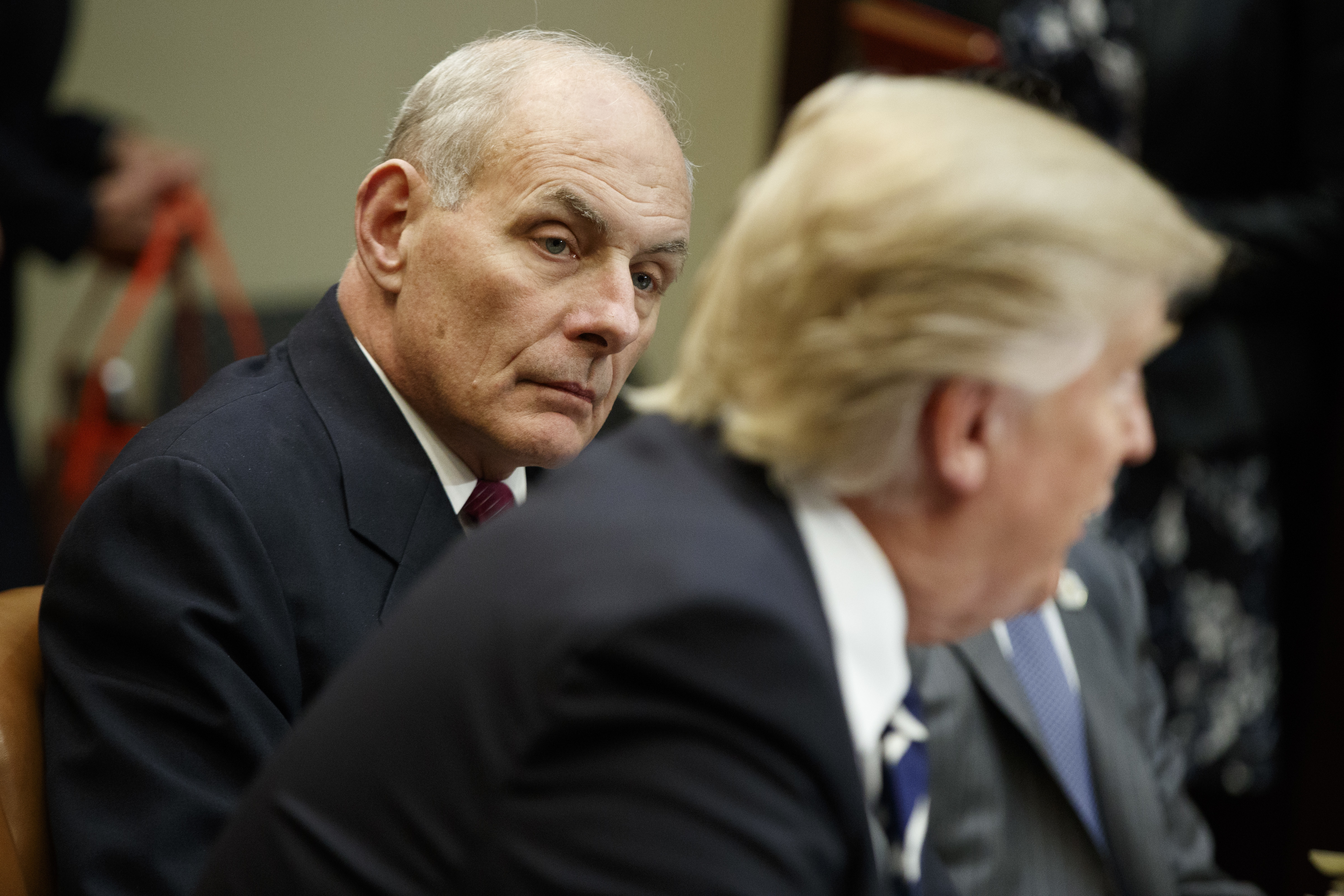 Former Homeland Security Secretary John Kelly, now Chief of Staff, listens as President Donald Trump speaks. CREDIT: AP Photo/Evan Vucci