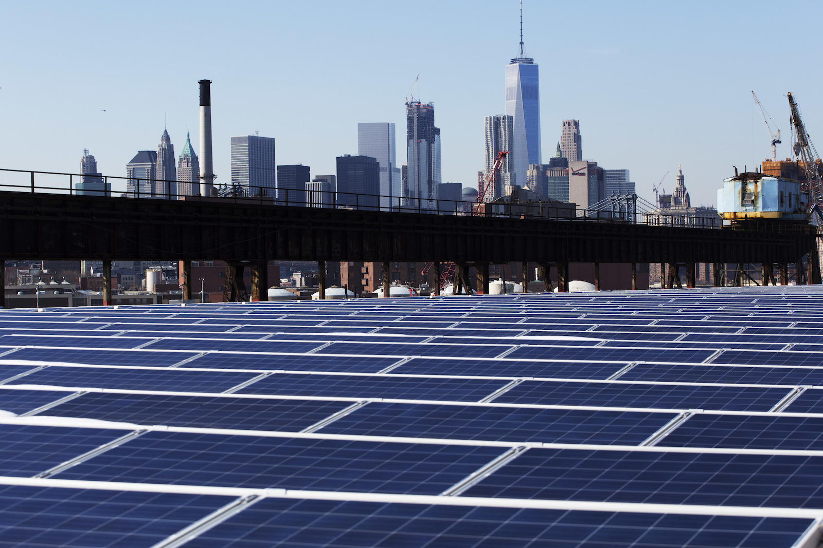 A Brooklyn Navy Yard rooftop covered with solar panels, February 14. State officials said investments in renewable projects like this one will help replace the power lost with closure of Indian Point nuclear plant. CREDIT: AP/Mark Lennihan
