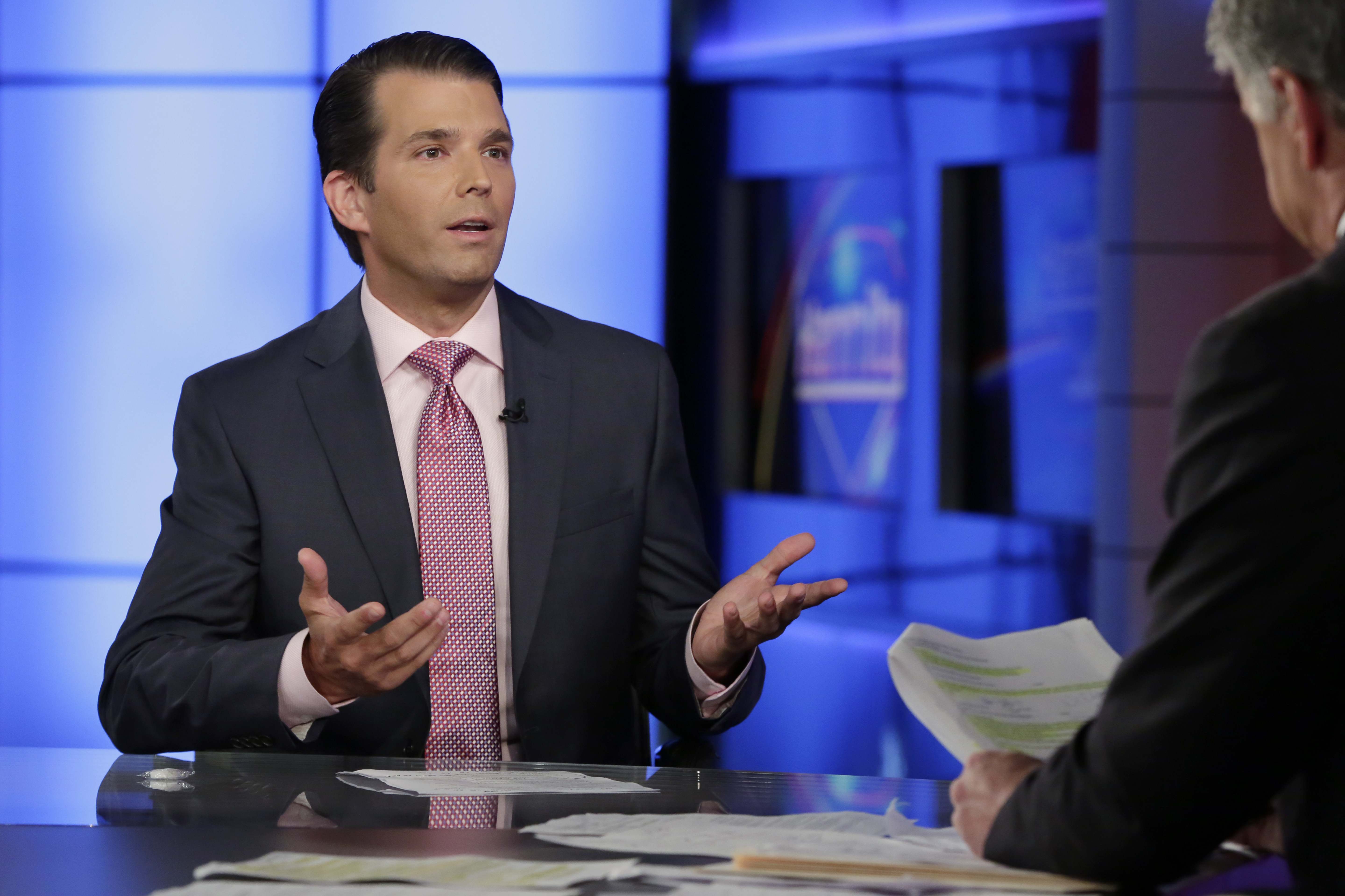 In this July 11, 2017 file photo, Donald Trump Jr., left, speaks in New York. A lawyer for a Russian developer says a company representative was the eighth person at a Trump Tower meeting brokered by Donald Trump Jr. during the campaign. (Credit: AP Photo/Richard Drew, File)