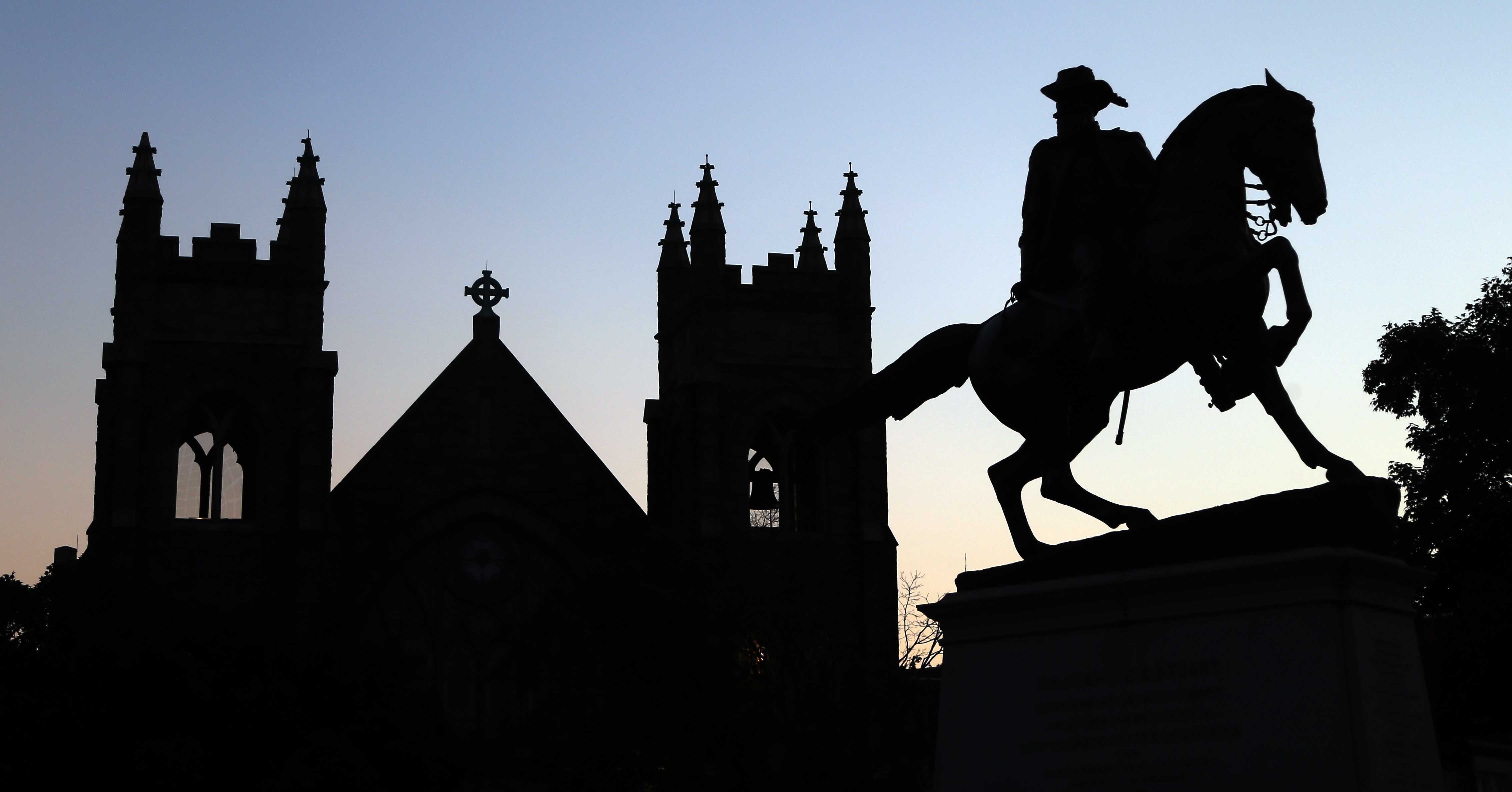 The statue of Confederate Gen. J.E.B. Stewart on Monument Avenue in Richmond, Va. Richmond Mayor Levar Stoney recently announced he thinks the monuments should stay put, though he appointed a commission to study adding historical context, likely with new signs or new statues. (AP Photo/Steve Helber)