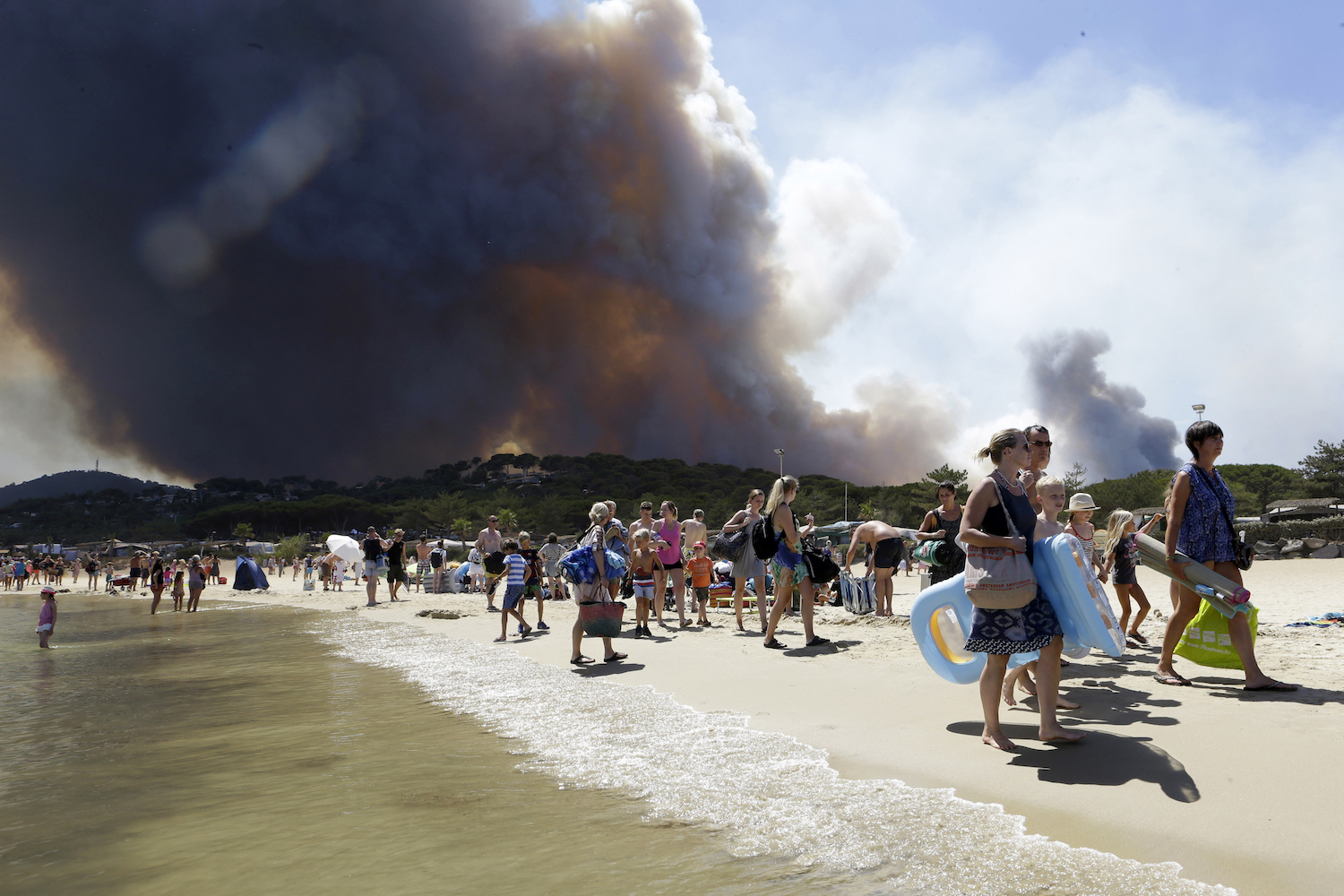 High temperatures have fueled wildfires in France. CREDIT: AP/Claude Paris