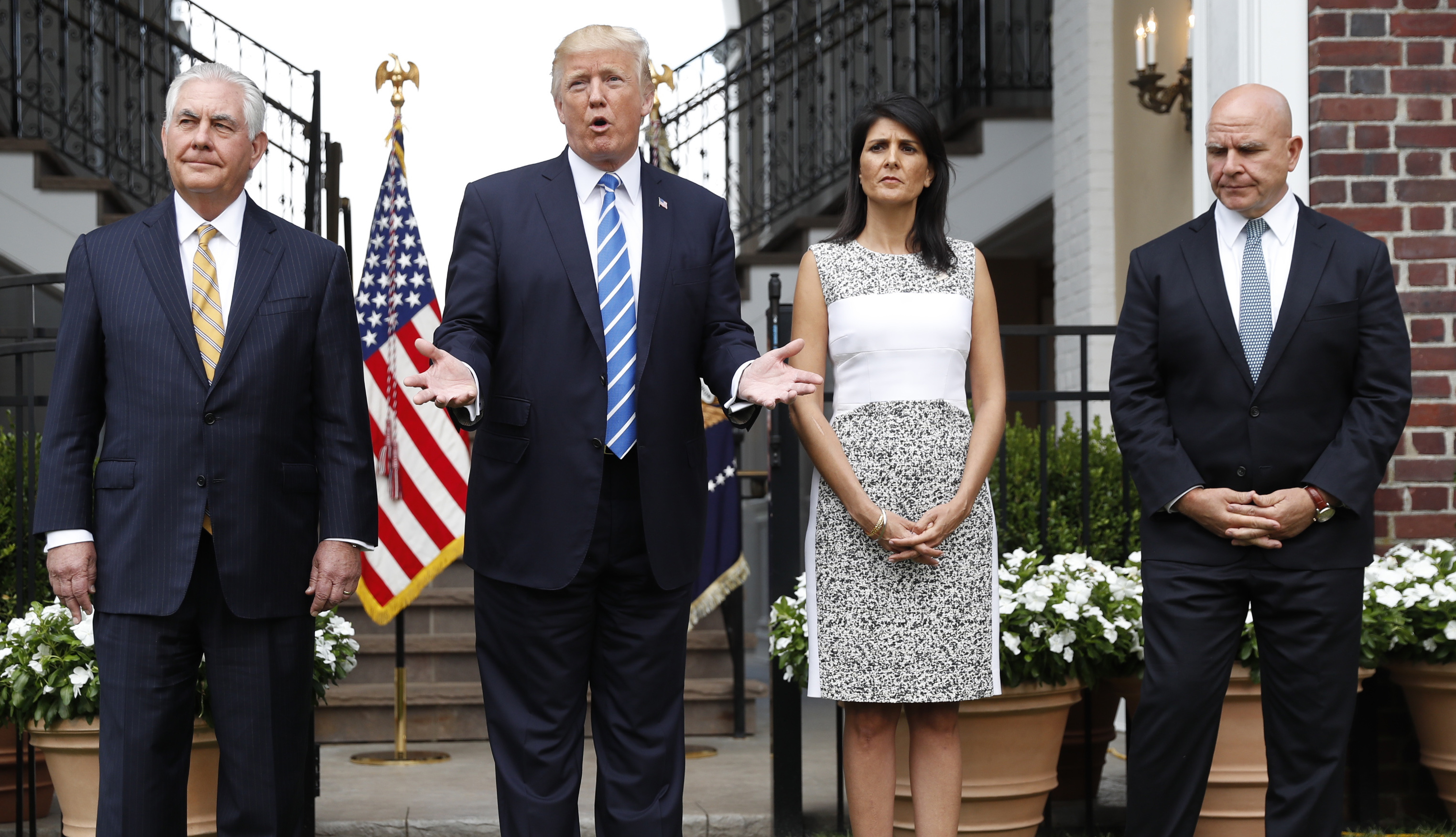 President Donald Trump speaks as Secretary of State Rex Tillerson, U.S. Ambassador to the United Nations Nikki Haley and national security adviser H.R. McMaster listen at Trump National Golf Club in Bedminster, N.J., CREDIT: AP Photo/Pablo Martinez Monsivais
