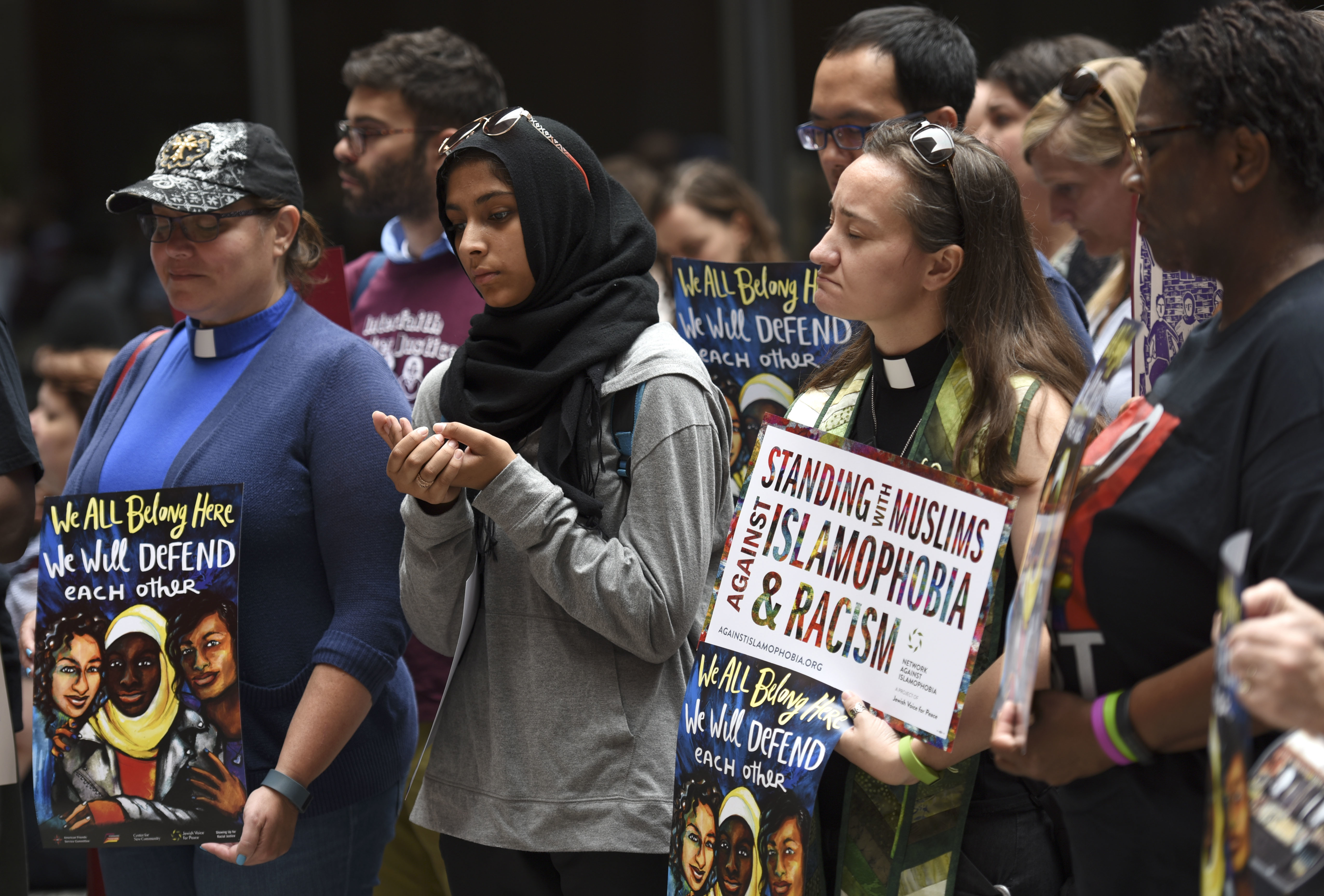 Chicago interfaith community gathered for a service to show solidarity with the people of Charlottesville, Va., Monday, Aug. 14, 2017, in Chicago. CREDIT: AP Photo/G-Jun Yam