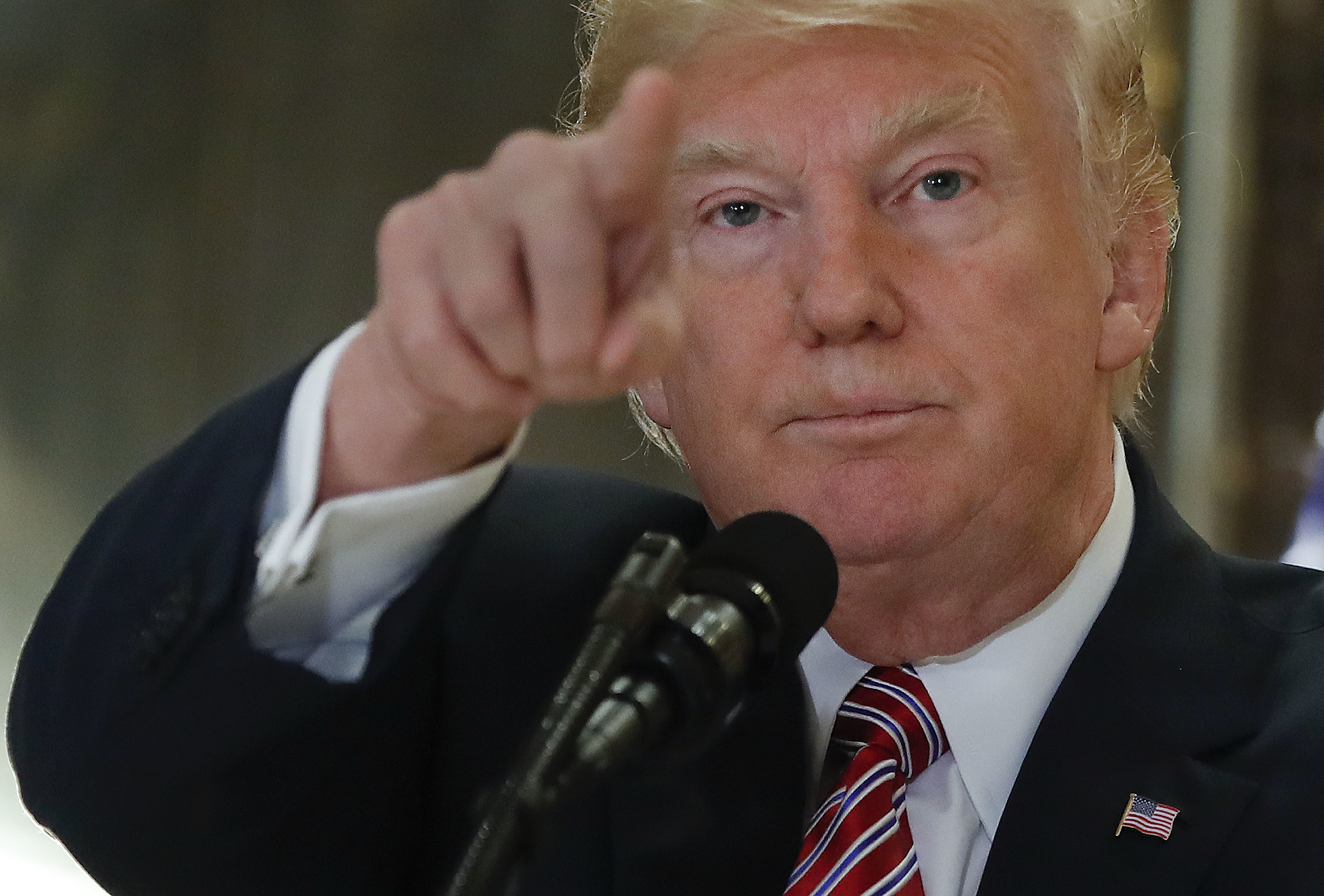 President Donald Trump points to a member of the media while speaking in the lobby of Trump Tower, Tuesday, Aug. 15, 2017 in New York. CREDIT: AP Photo/Pablo Martinez Monsivais