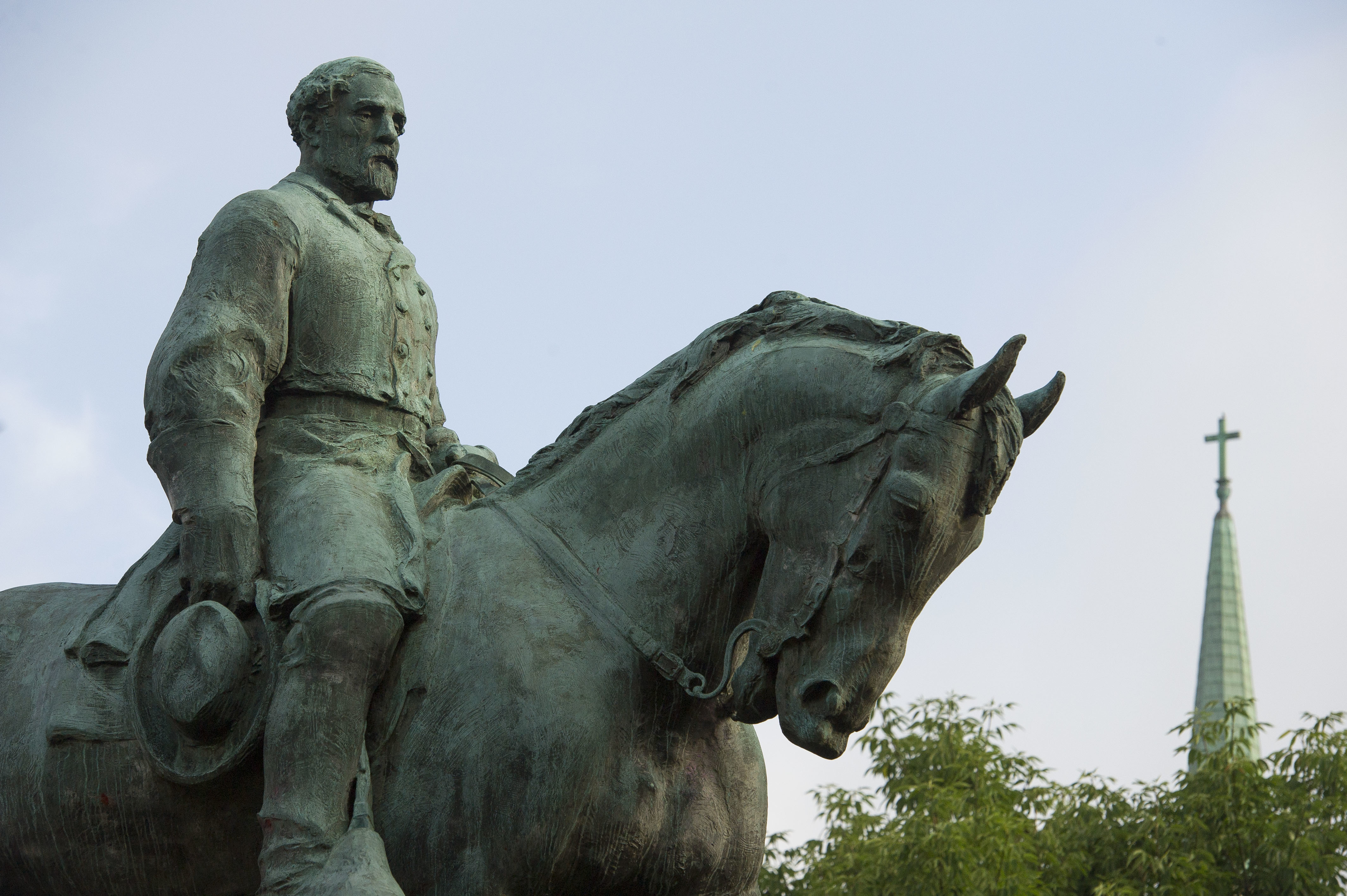 The statue of Confederate Army of Northern Virginia Gen. Robert E. Lee stands in Emancipation Park in Charlottesville, Va., Friday, Aug. 18, 2017. Charlottesville Mayor Mike Signer is expected to make an announcement regarding the Robert E. Lee statue later in the day. CREDIT: AP Photo/Cliff Owen