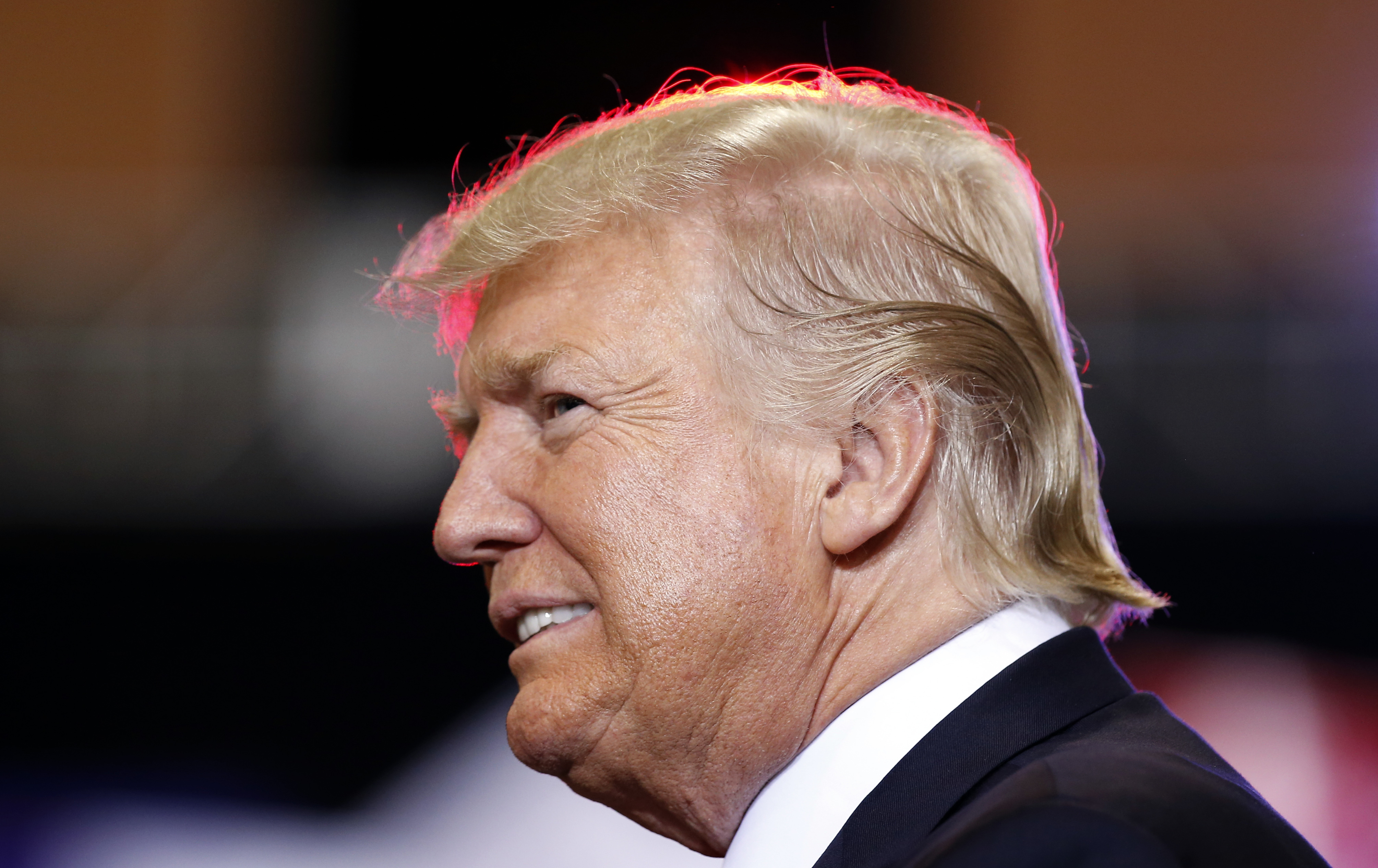 President Donald Trump pauses before speaking at a "Make America Great Again," rally at the Phoenix Convention Center, Tuesday, Aug. 22, 2017, in Phoenix. CREDIT: AP Photo/Alex Brandon