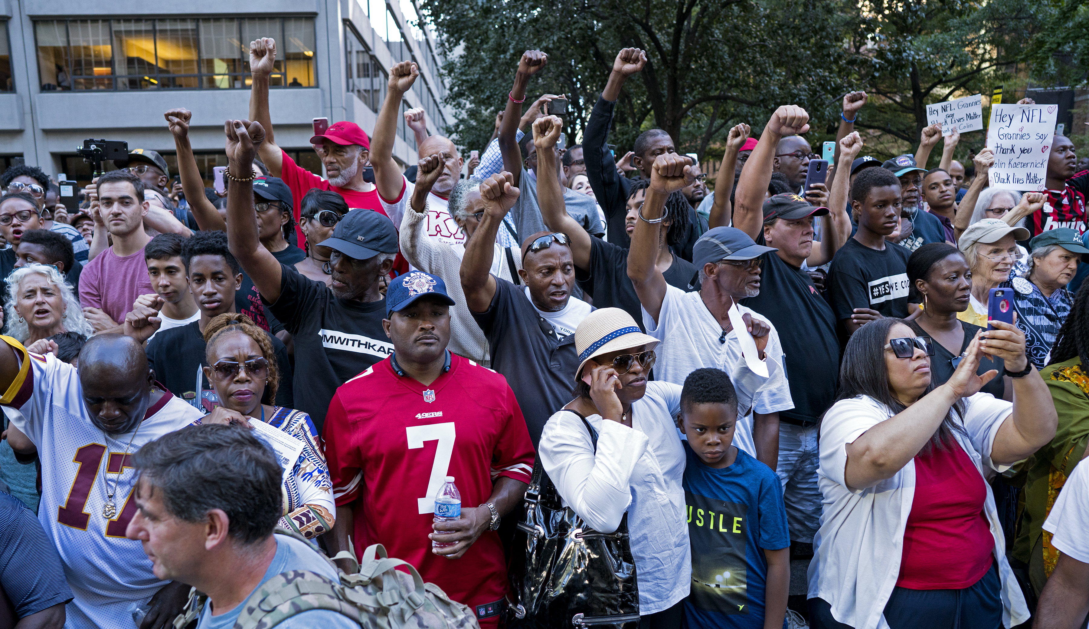 Protesters voice their support for Kaepernick in front of NFL headquarters, Aug. 23, 2017. CREDIT: AP Photo/Craig Ruttle