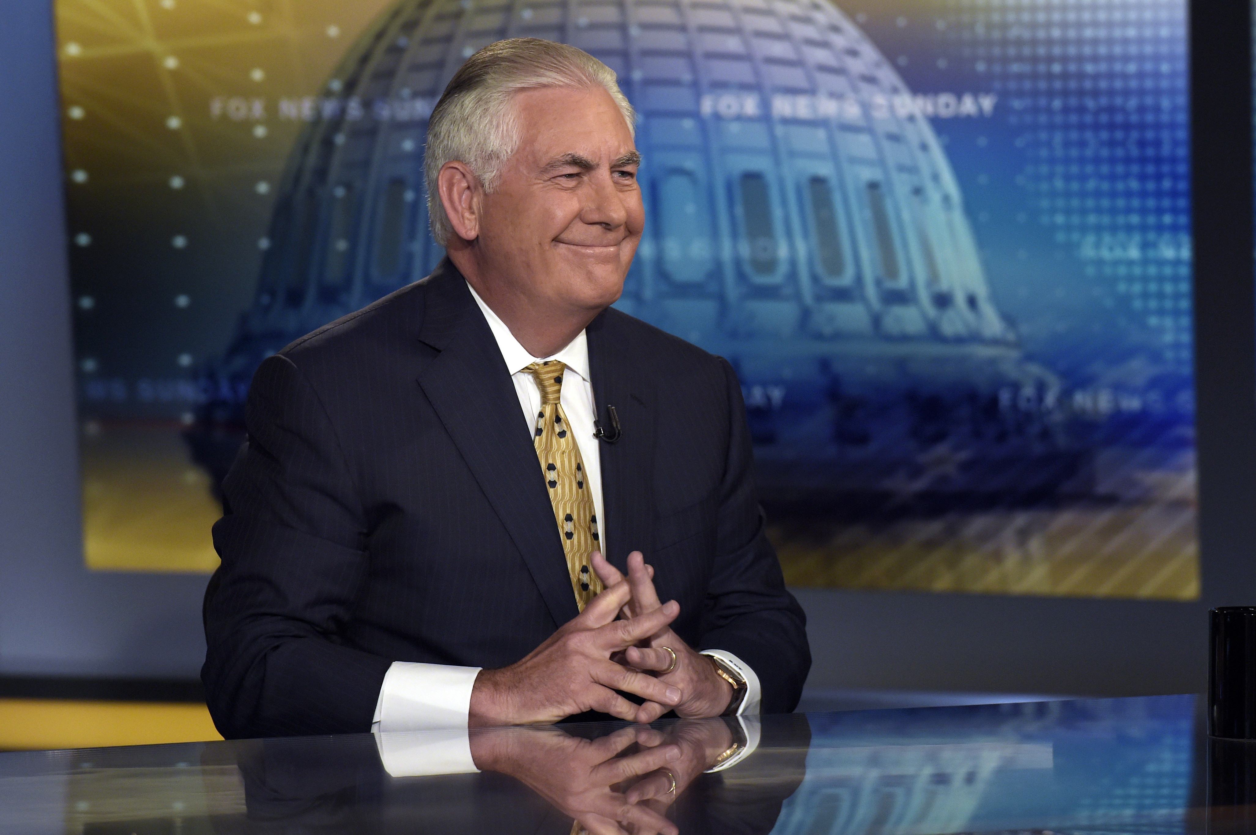 Secretary of State Rex Tillerson smiles after finishing a television interview FOX News. CREDIT: AP Photo/Susan Walsh