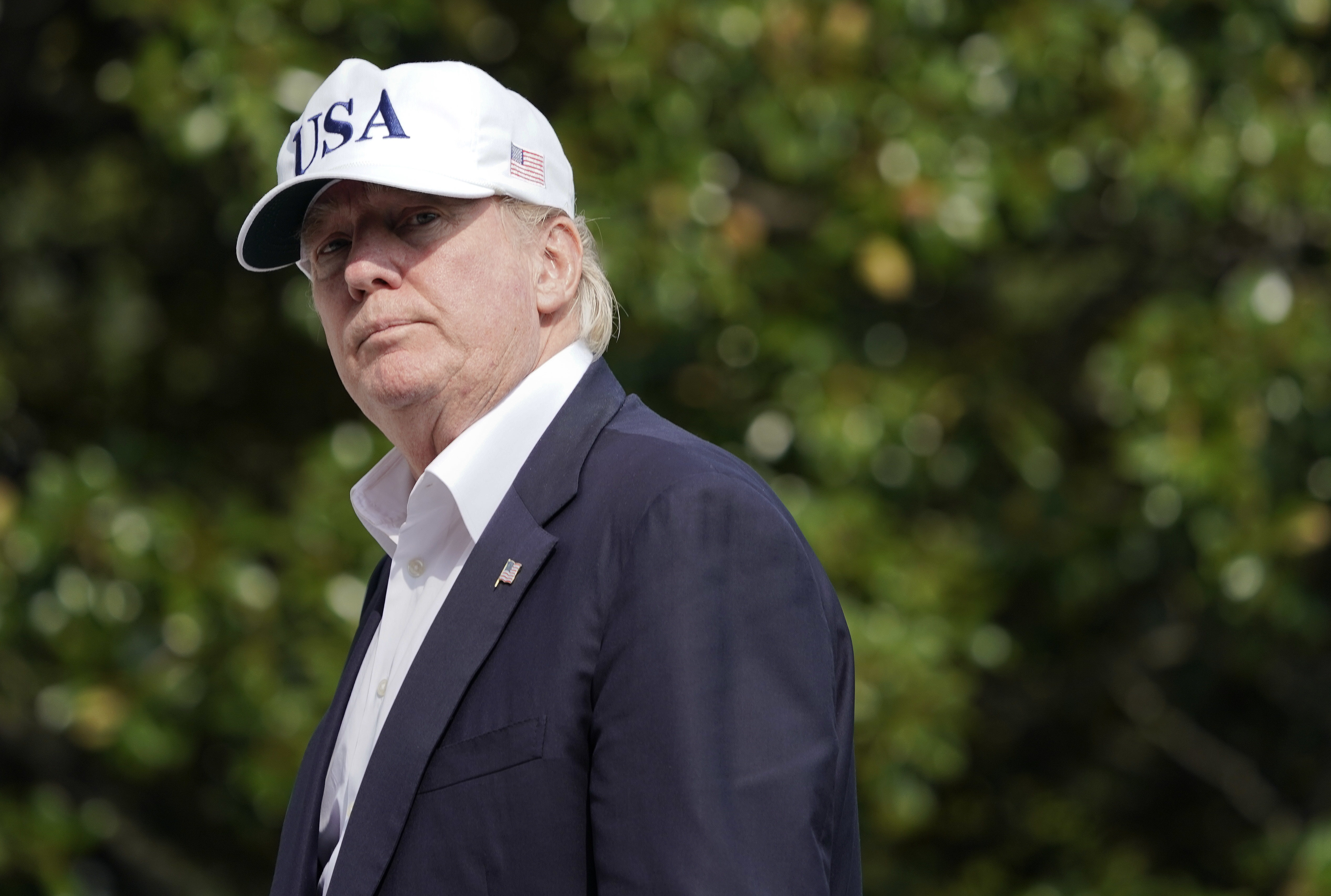 President Donald Trump walks across the South Lawn of the White House in Washington, Sunday, Aug. 27, 2017, following his return after spending the weekend at nearby Camp David, Md., (AP Photo/Pablo Martinez Monsivais)