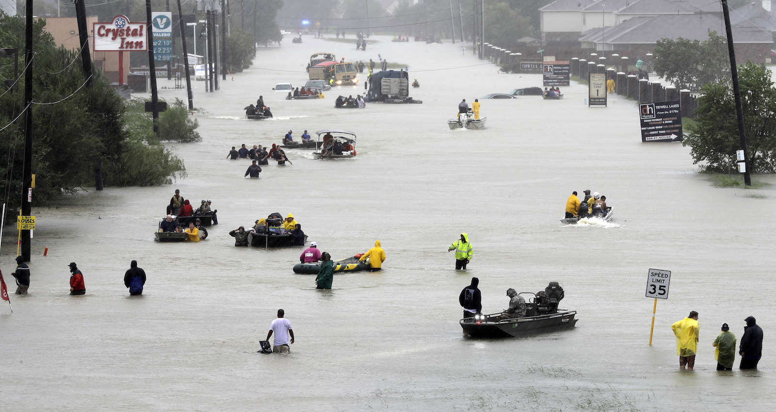 Rescue boats fill a Houston street from flooded from superstorm Harvey. August 28. CREDIT: AP/David J. Phillip