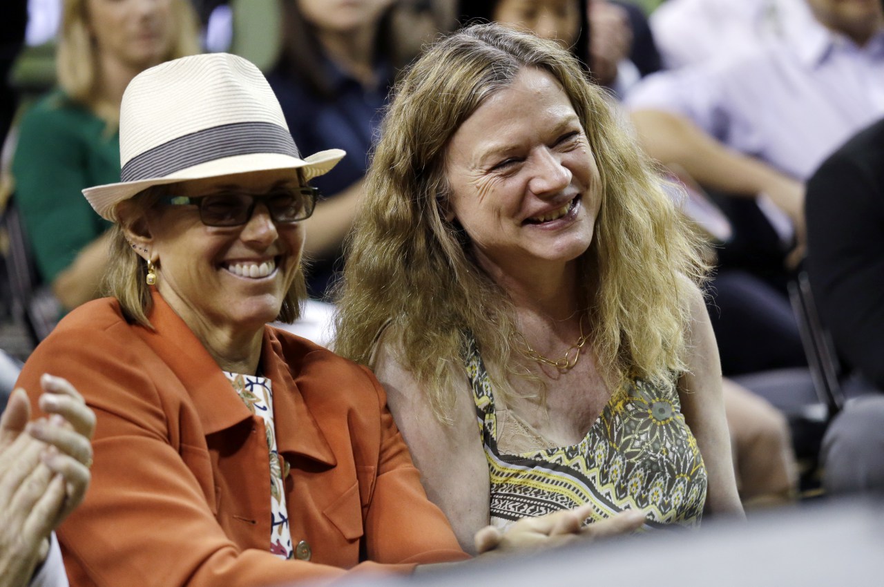 Two of three Seattle Storm owners Ginny Gilder, left, Dawn Trudeau, smile as they look on at a news conference Thursday, April 21, 2016, in Seattle. The Seattle Storm unveiled No. 1 pick Breanna Stewart, alongside former No. 1 pick and soon-to-be teammate Sue Bird. (AP Photo/Elaine Thompson)