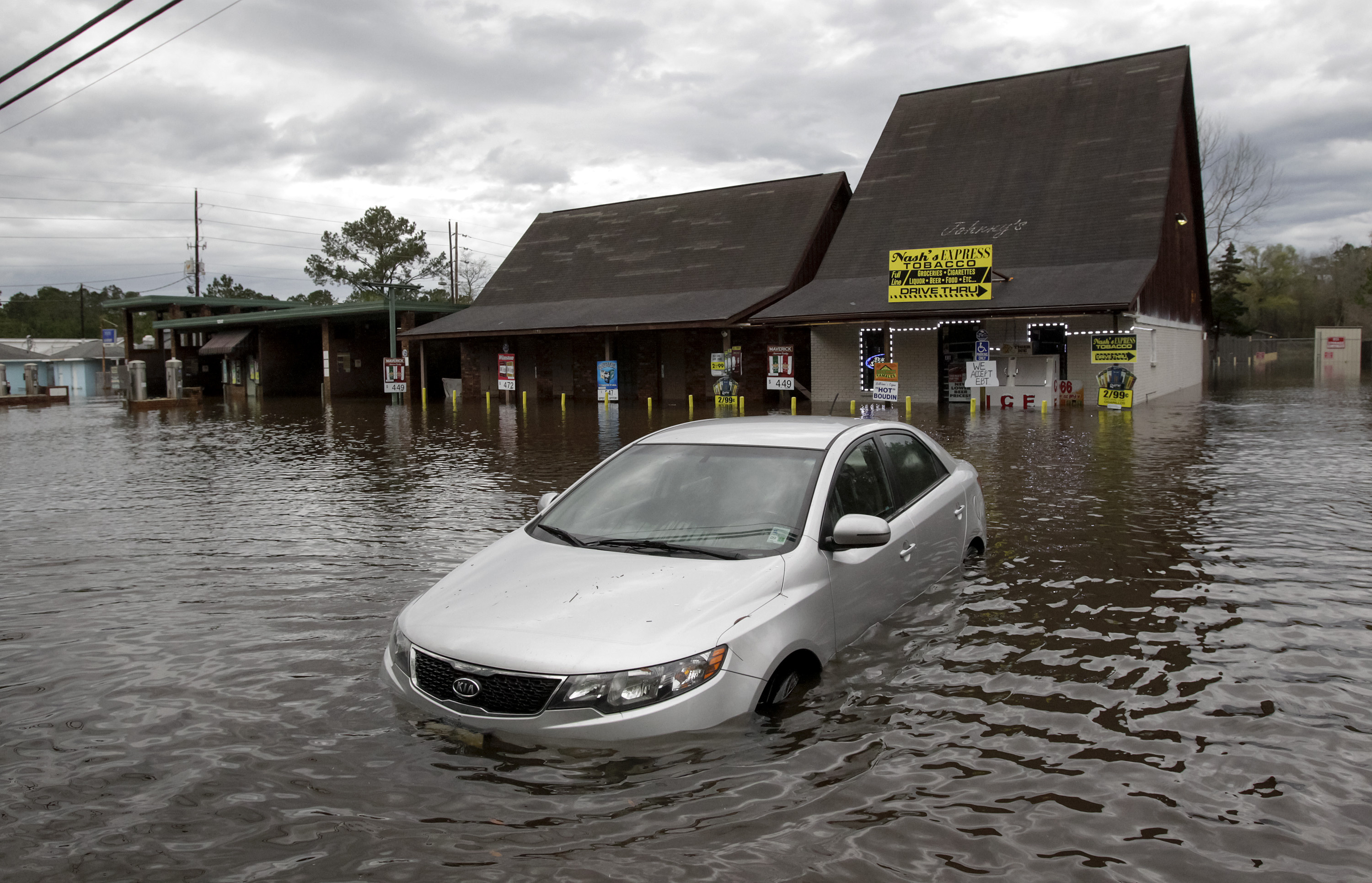 Torrential rains pounded northern Louisiana for several days in 2016, trapping people in their homes, leaving scores of roads impassable and causing widespread flooding. CREDIT: AP Photo/Scott Threlkeld