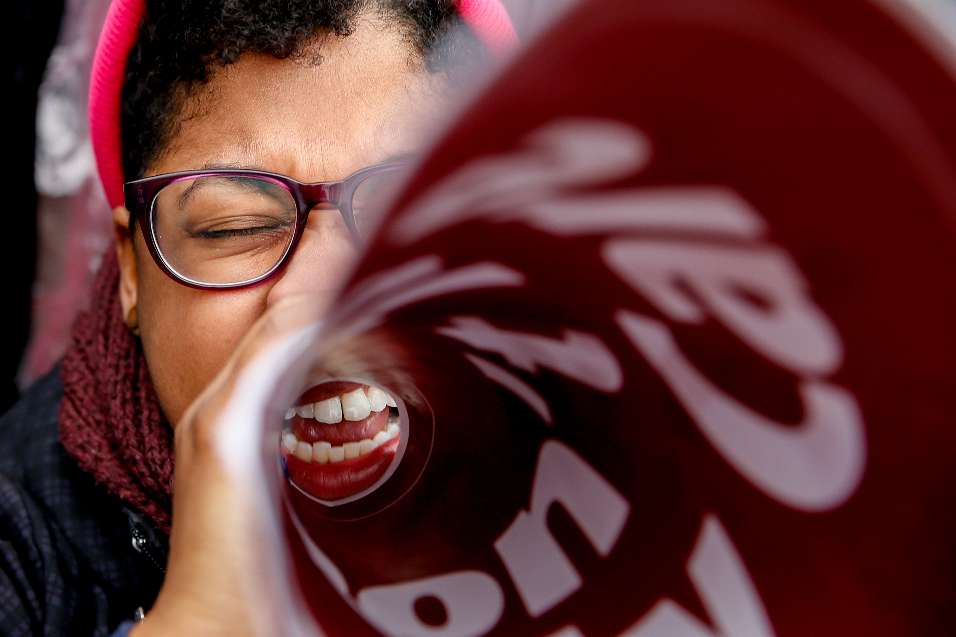 Latoya Watson of Washington, with Planned Parenthood, cheers during a rally outside the Supreme Court in Washington, Wednesday, March 4, 2015, as the court was hearing arguments in King v. Burwell, a major test of President Barack Obama's health overhaul which, if successful, could halt health care premium subsidies in all the states where the federal government runs the insurance marketplaces. CREDIT: AP Photo/Andrew Harnik