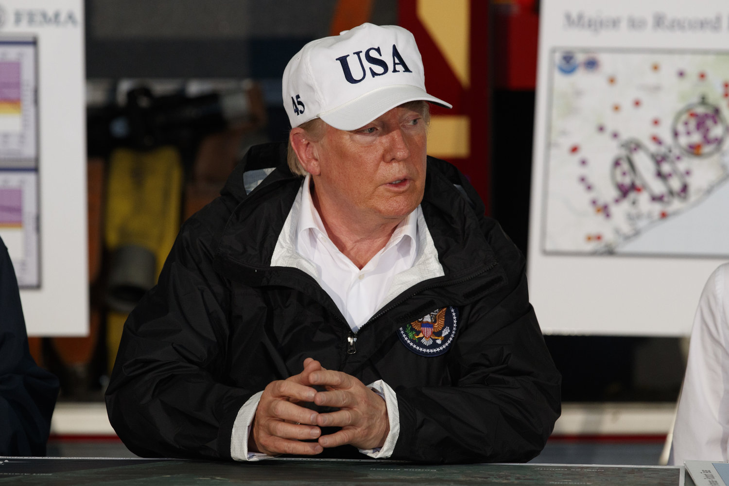 President Donald Trump participates in a briefing on Harvey relief efforts, Tuesday, Aug. 29, 2017, in Corpus Christi, Texas. (AP Photo/Evan Vucci)