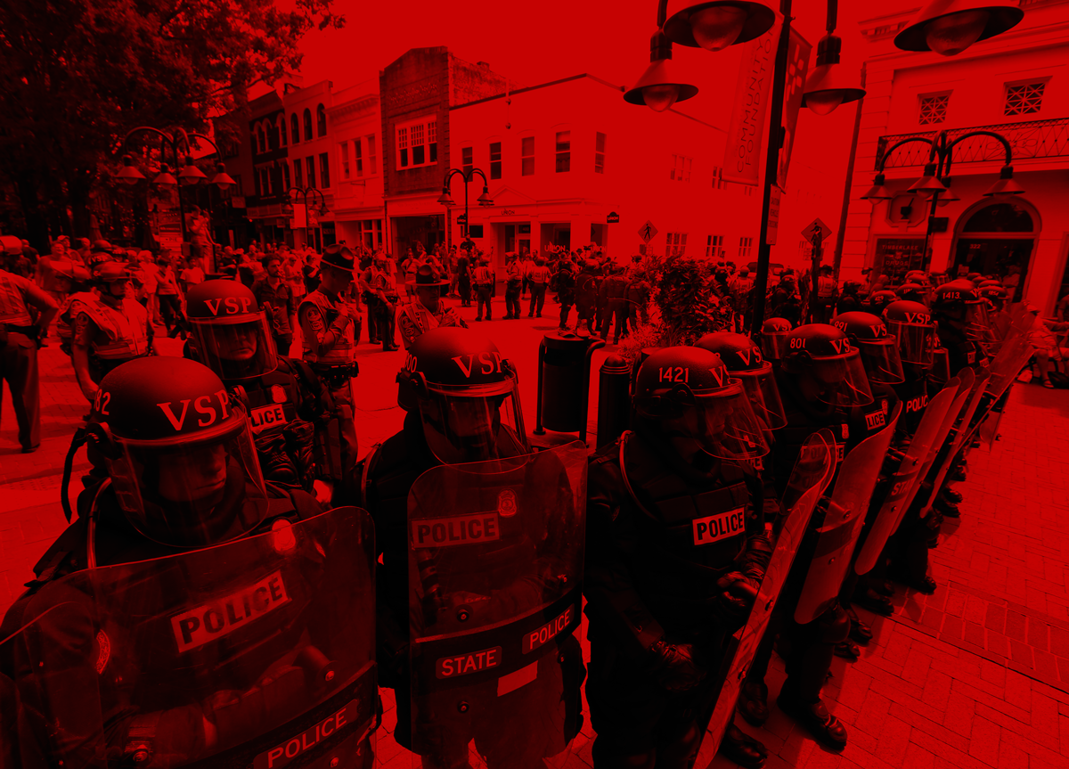 Virginia State Police cordon off an area around the site where a car ran into a group of protesters after a white nationalist rally in Charlottesville, Va., Saturday, Aug. 12, 2017. CREDIT: AP Photo/Steve Helber; Edit by Diana Ofosu