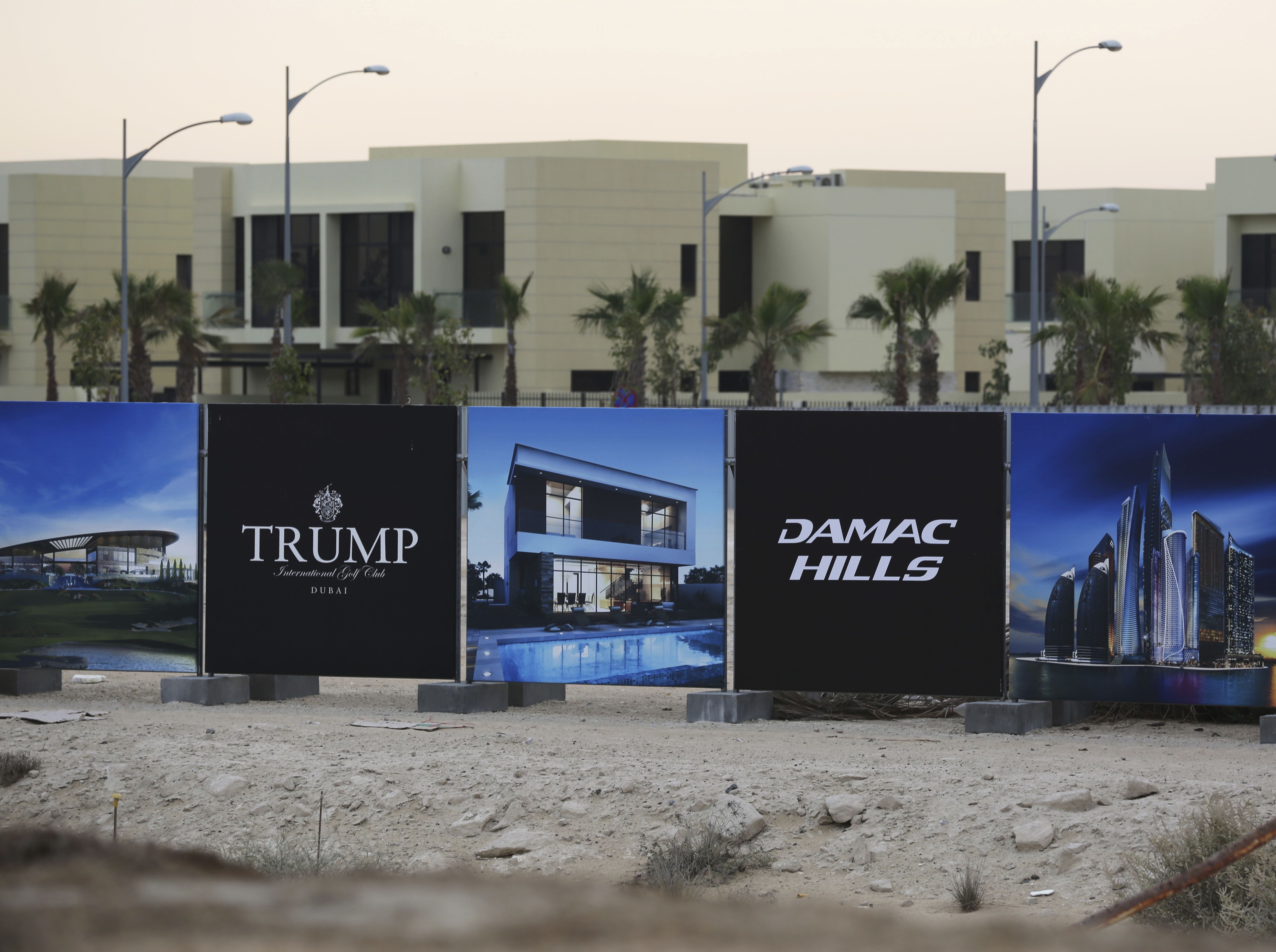 A new sign sits on display for the Trump International Golf Club in Dubai, United Arab Emirates, Sunday, Feb. 12, 2017. DAMAC Properties, the Dubai-based developer that partnered with the Trump Organization on the golf course, has renamed the development surrounding the course DAMAC Hills. It was previously named Akoya. (Credit: AP Photo/Jon Gambrell)