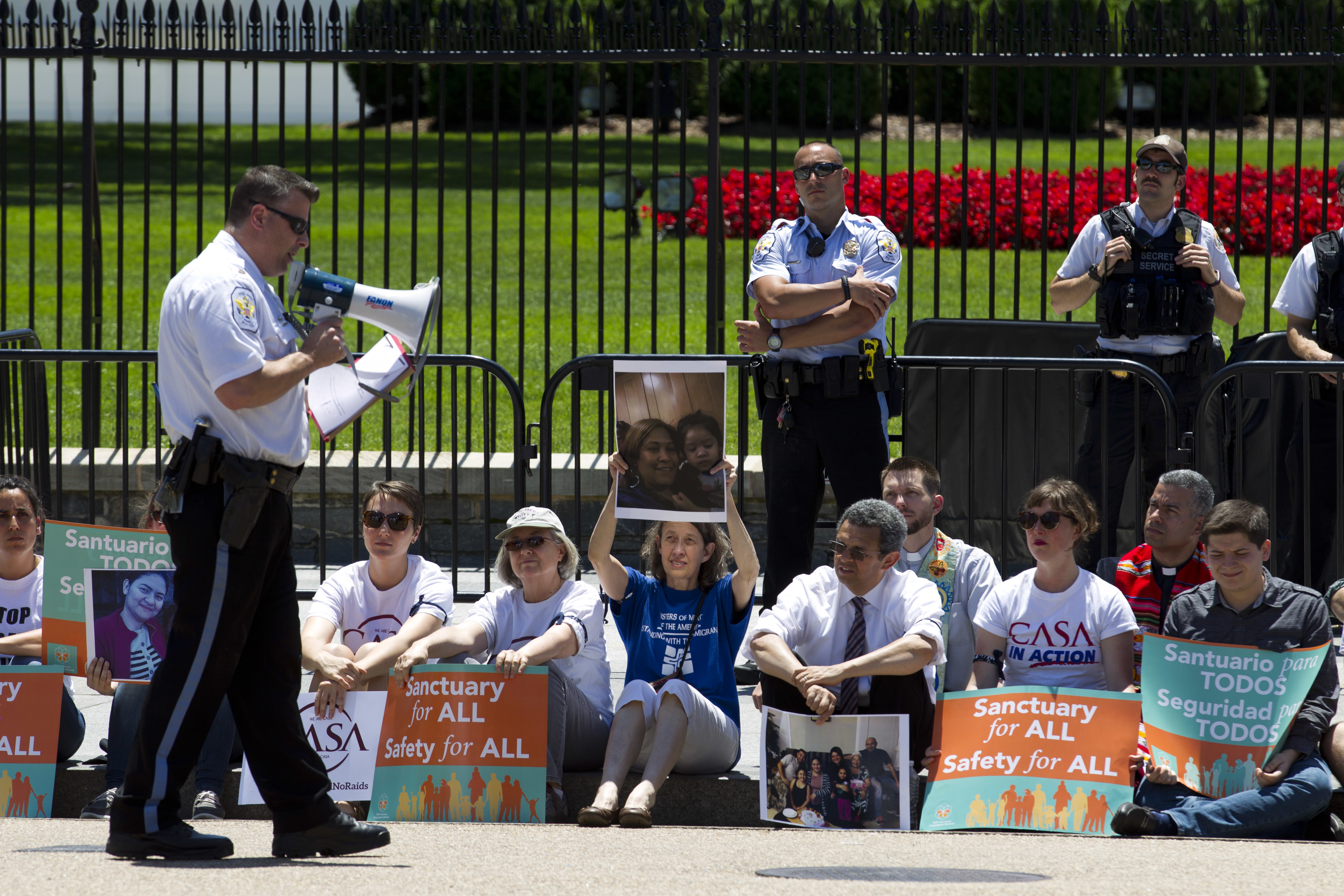 Clergy and other demonstrators at an immigration-themed protest outside the White House in June 2017. (CREDIT: AP/Jose Luis Magana)