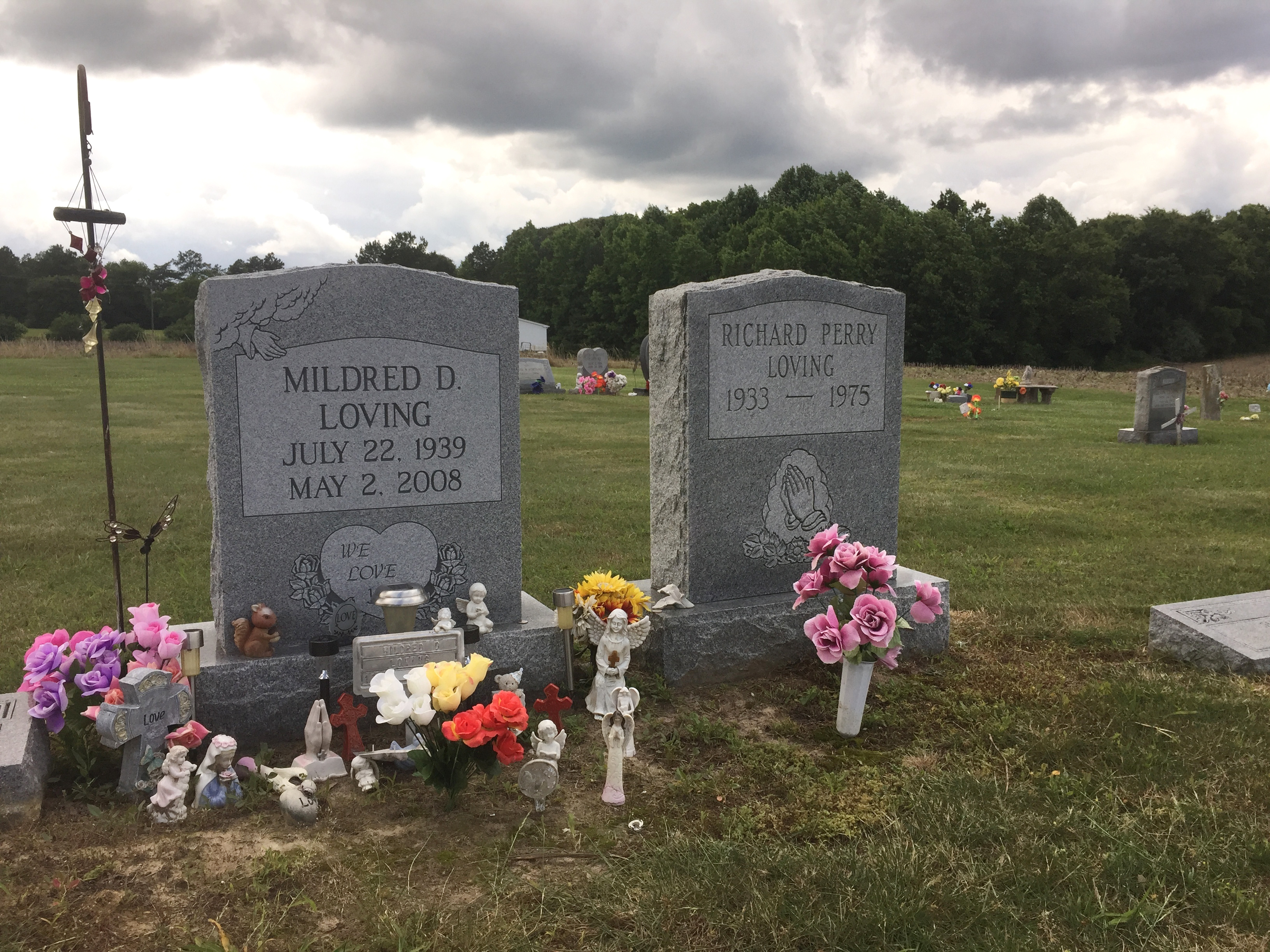 The graves of Richard and Mildred Loving are seen in a rural cemetery near their former home in Caroline County, Virginia, Wednesday, June 7, 2017. Richard Loving, a white man, and his wife Mildred, a black woman, challenged Virginia’s ban on interracial marriage and ultimately won their case at the U.S. Supreme Court in 1967 (AP Photo/Jessica Gresko)