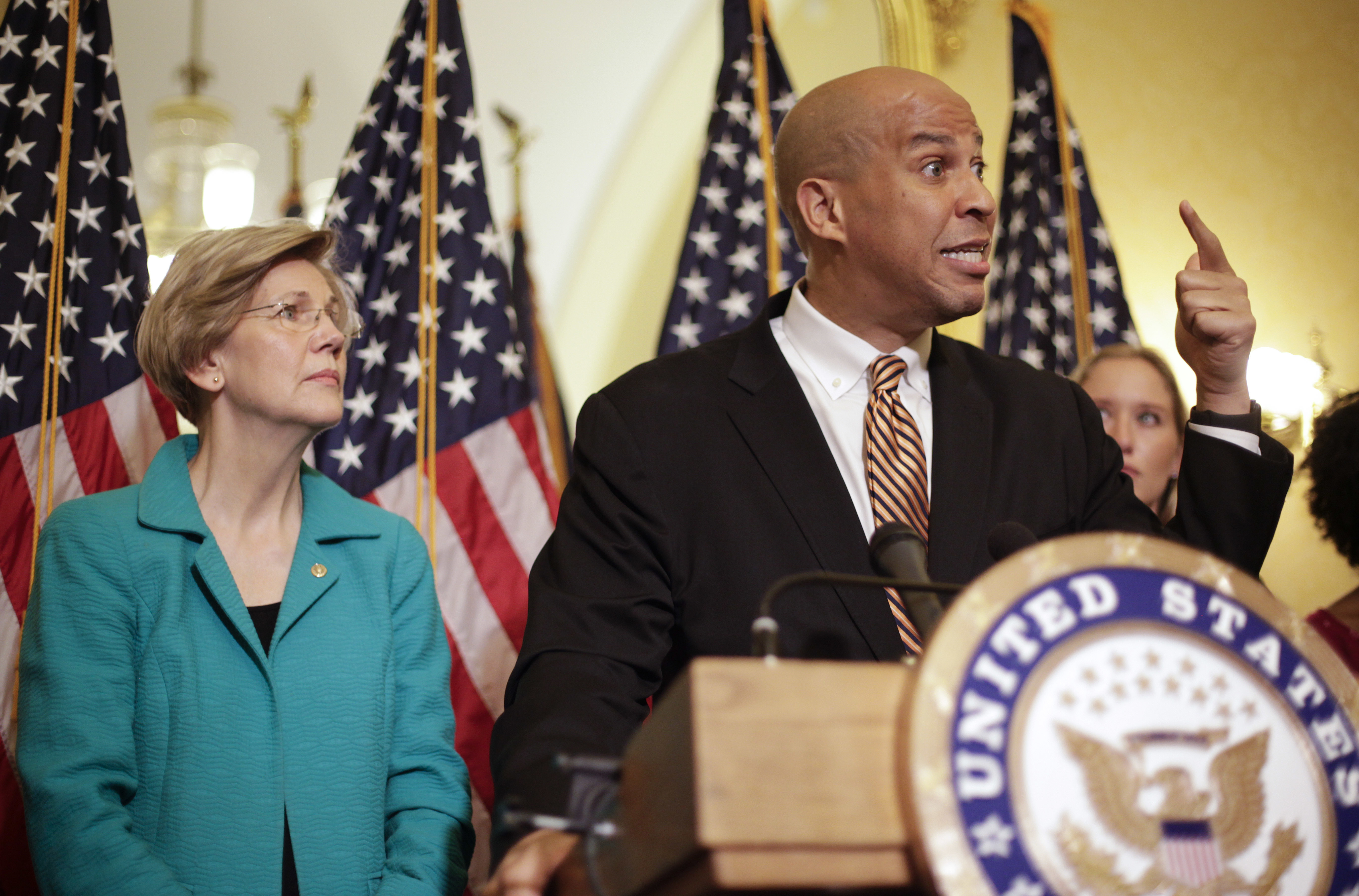Sen. Cory Booker, D-N.J. and Sen. Elizabeth Warren, D-Mass. participate in a news conference on Capitol Hill in Washington, Tuesday, July 11, 2017, to discuss the introduction of the Dignity for Incarcerated Women Act. The bill helps address some of the unique challenges women face while in prison. CREDIT: AP Photo/Pablo Martinez Monsivais