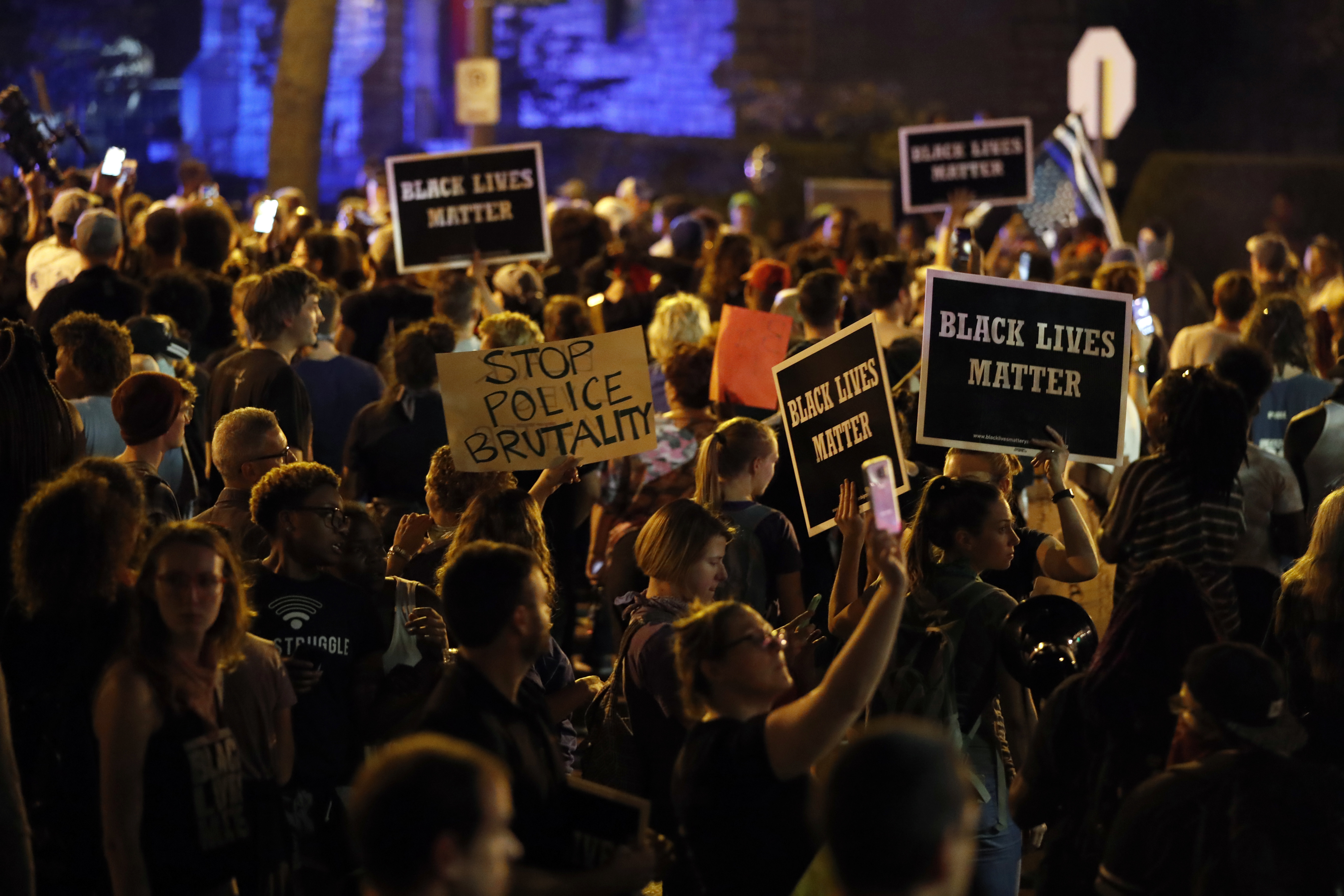 Protesters gather, Friday, Sept. 15, 2017, in St. Louis, after a judge found a white former St. Louis police officer, Jason Stockley, not guilty of first-degree murder in the death of a black man, Anthony Lamar Smith, who was fatally shot following a high-speed chase in 2011. CREDIT: AP Photo/Jeff Roberson