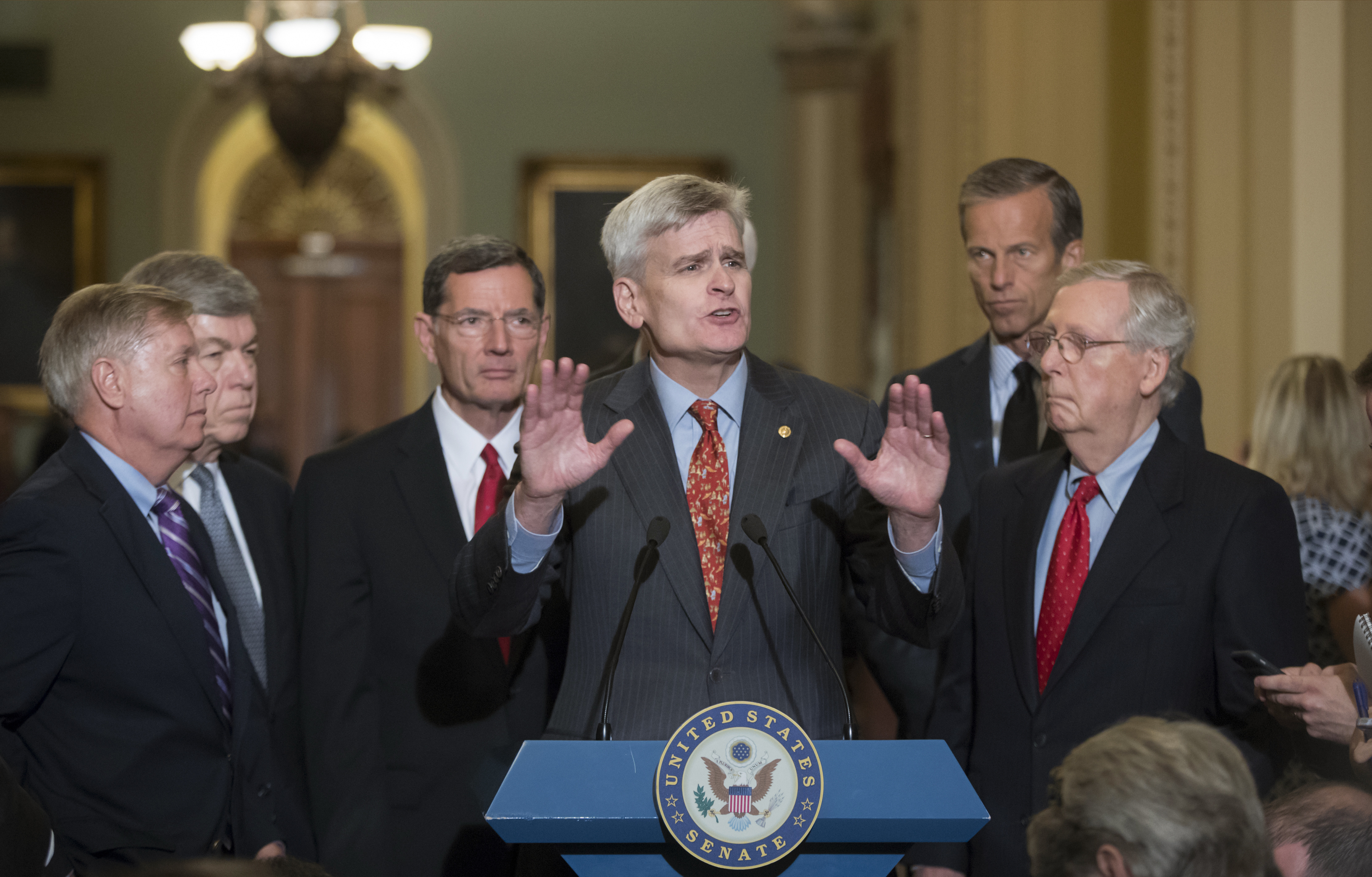Sen. Bill Cassidy (R-LA) caught a fish that was THIS BIG. CREDIT: AP Photo/J. Scott Applewhite