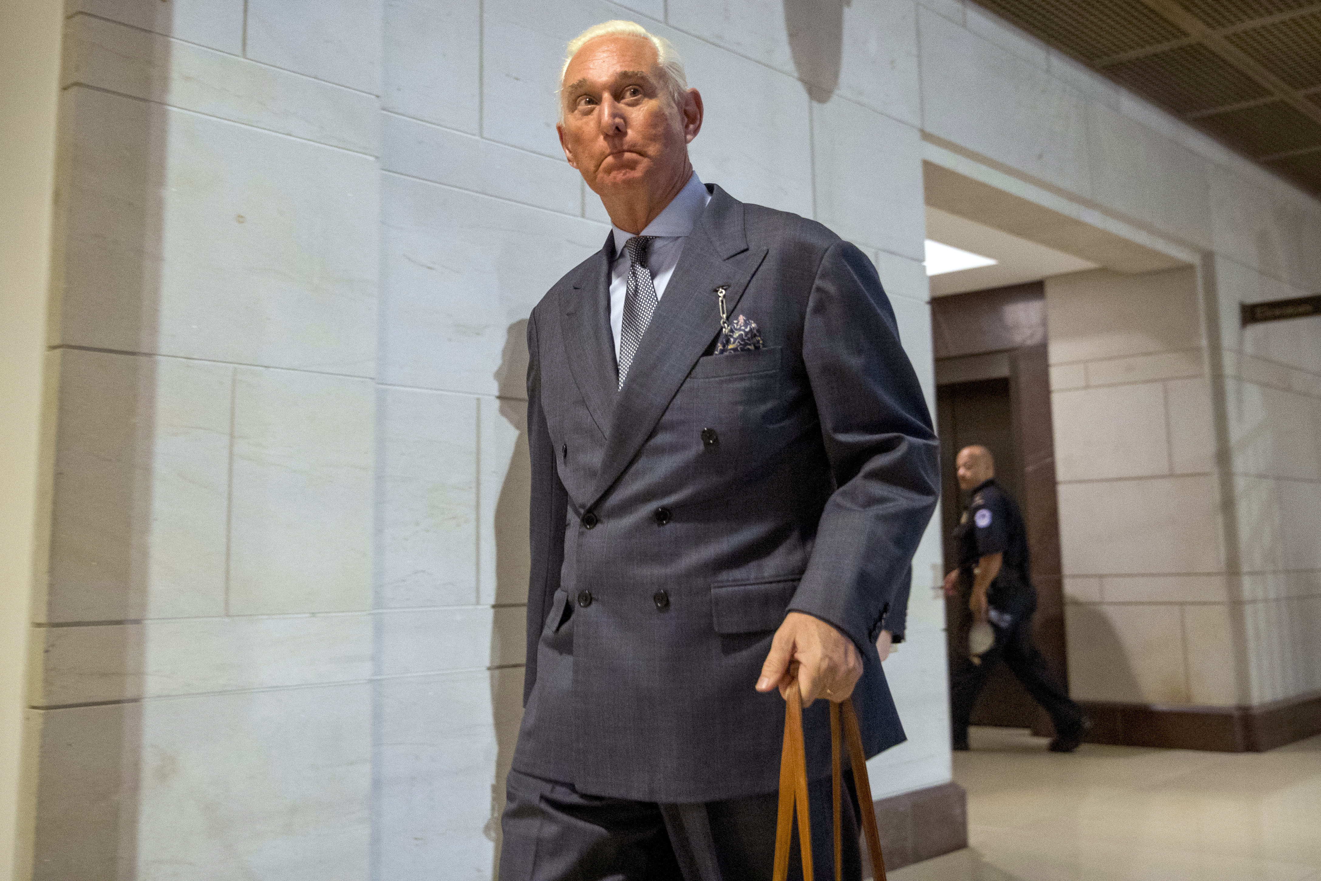 Longtime Donald Trump associate Roger Stone arrives to testify before the House Intelligence Committee, on Capitol Hill, Tuesday, Sept. 26, 2017, in Washington. (AP Photo/Andrew Harnik)