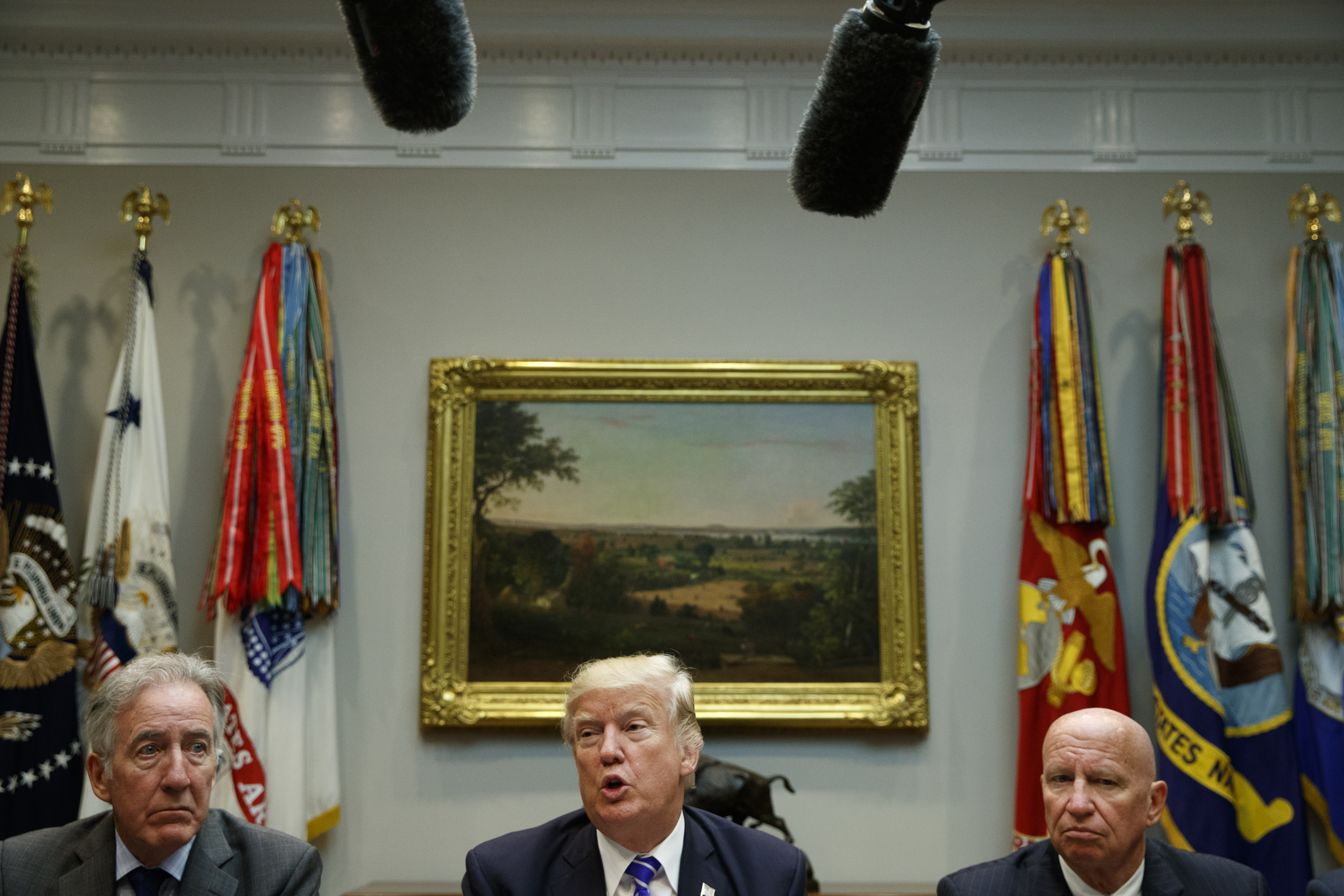 President Donald Trump speaks during a meeting with members of the House Ways and Means committee in the Roosevelt Room of the White House, Tuesday, Sept. 26, 2017, in Washington. From left, Rep. Richard Neal, D-Mass., Trump, Rep. Kevin Brady, R-Texas, and Rep. Kenny Marchant, R-Texas. (AP Photo/Evan Vucci)