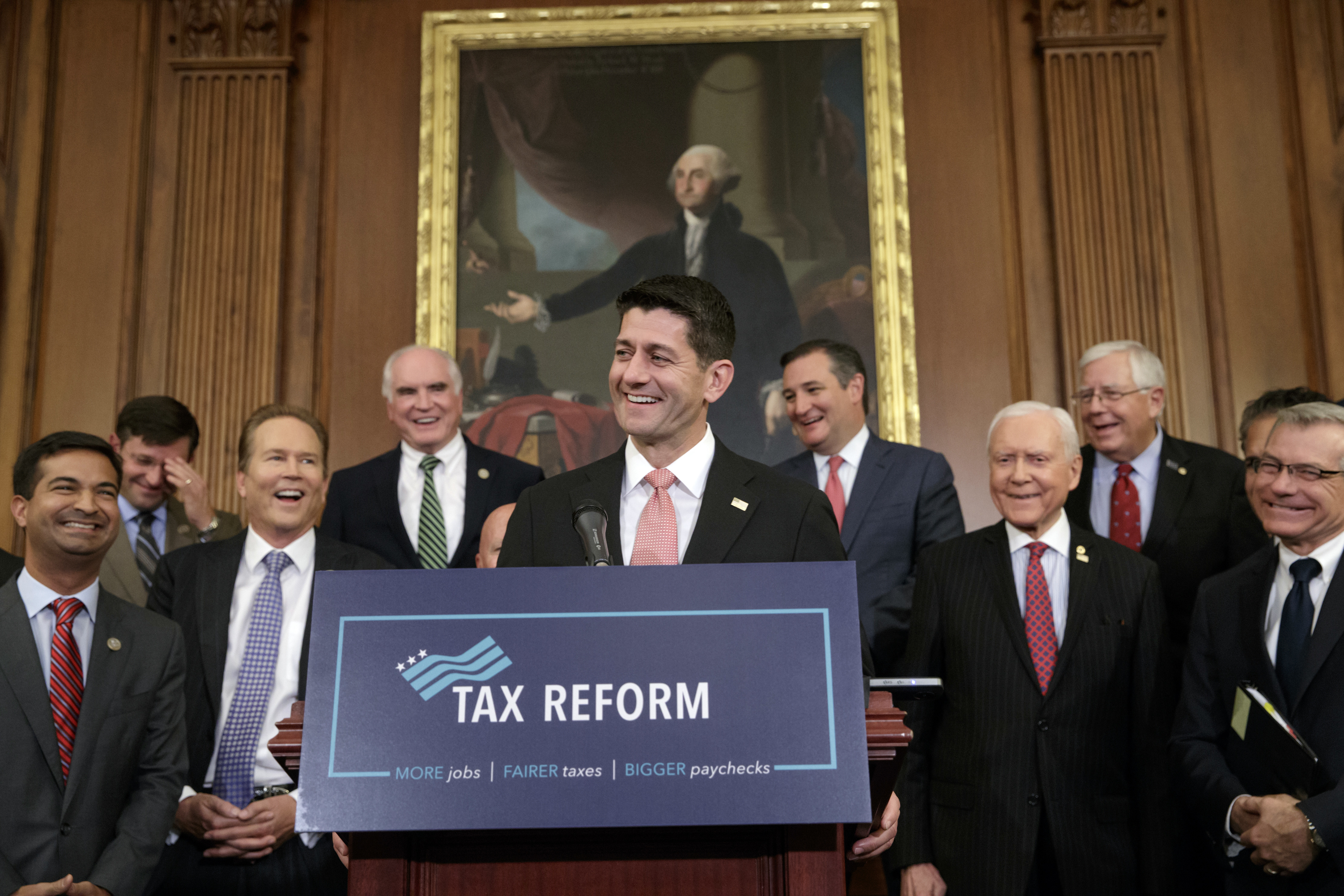 Speaker of the House Paul Ryan, R-Wis., smiles as he talks about the Republicans' proposed rewrite of the tax code for individuals and corporations, at the Capitol in Washington, Wednesday, Sept. 27, 2017. President Donald Trump and congressional Republicans are writing a far-reaching, $5-trillion plan they say would simplify the tax system and nearly double the standard deduction used by most Americans. (AP Photo/J. Scott Applewhite)