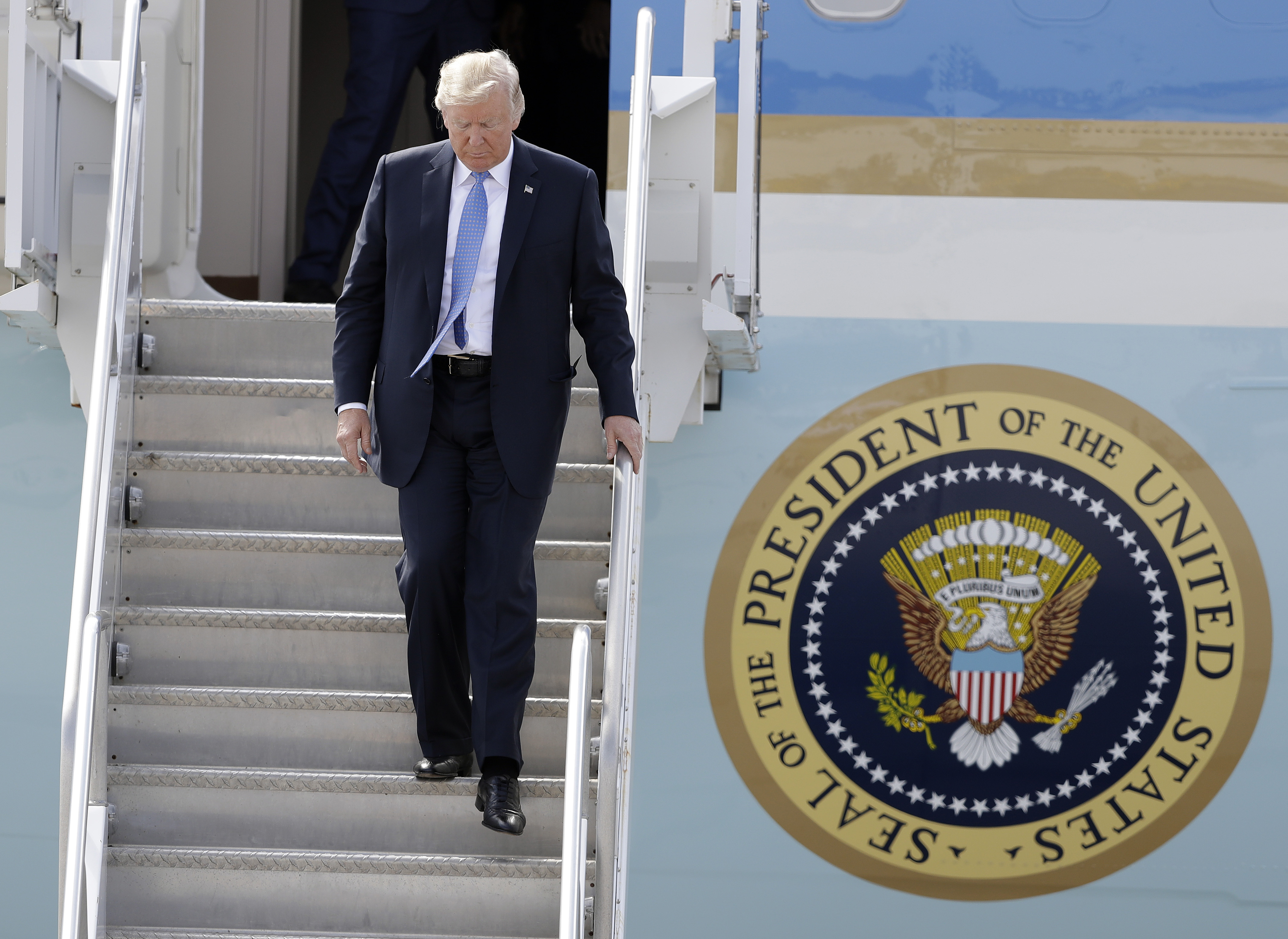 President Trump arrives in Indiana Wednesday. CREDIT: AP Photo/Darron Cummings
