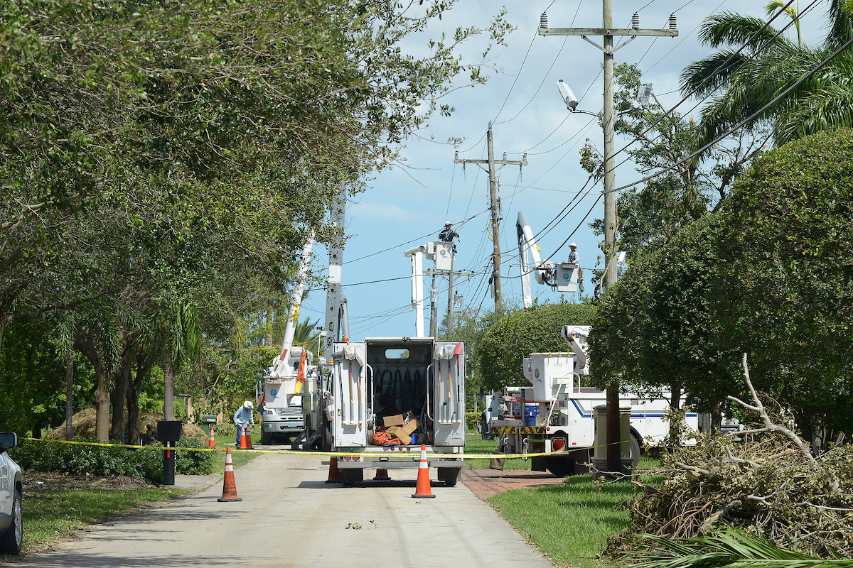 Florida Power & Light crews work to restore power in South Florida on September 12, 2017. CREDIT: Florida Power & LIght