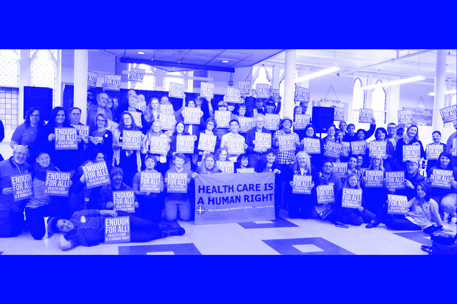 ACTIVISTS IN MAINE POSE WITH SIGNS/EDIT BY DIANA OFOSU