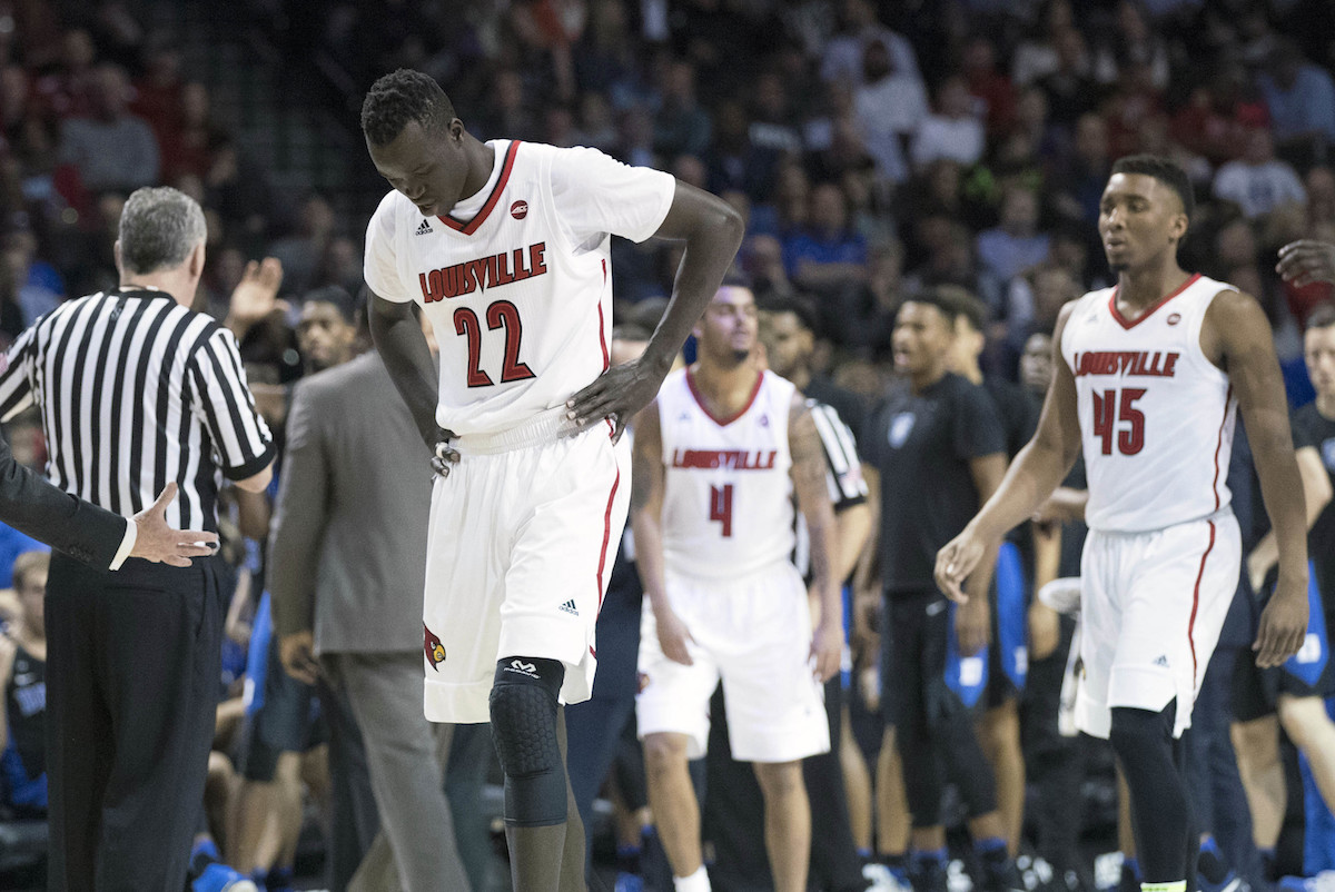 Louisville head coach Rick Pitino, left, talks to his team as they come to the bench during a time out in the second half of an NCAA college basketball game against the Duke in the Atlantic Coast Conference tournament, March 9, 2017, in New York. Duke won 81-77. (CREDIT: AP Photo/Mary Altaffer)