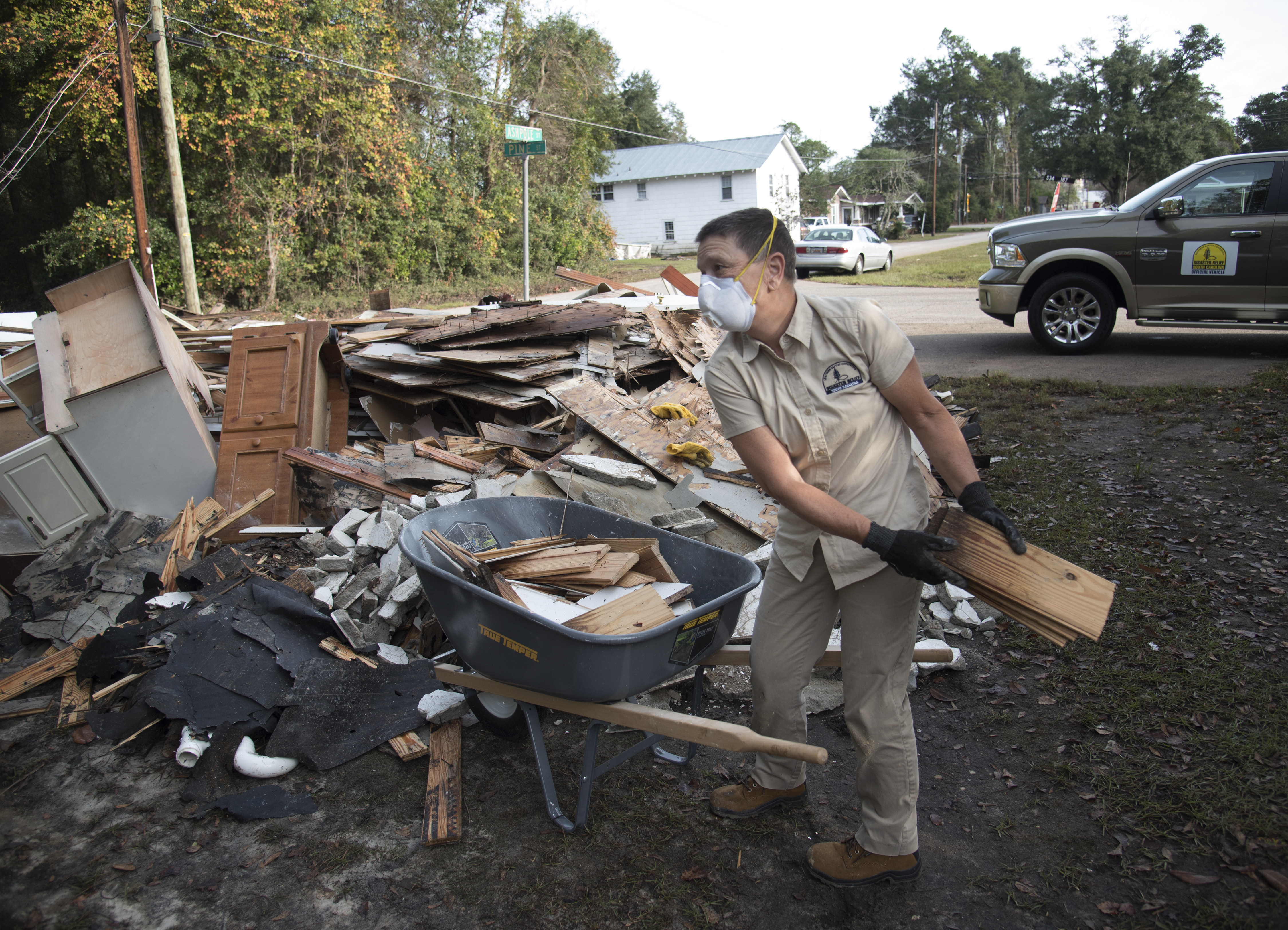 Hurricane Matthew caused heavy damage in Nichols, South Carolina in October 2016. A stew of contaminants stood inches to feet deep in homes for a week. CREDIT: AP Photo/Mike Spencer