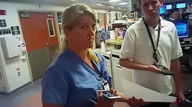 A nurse was arrested for following hospital policy. CREDIT: Screenshot from video obtained by Salt Lake Tribune.