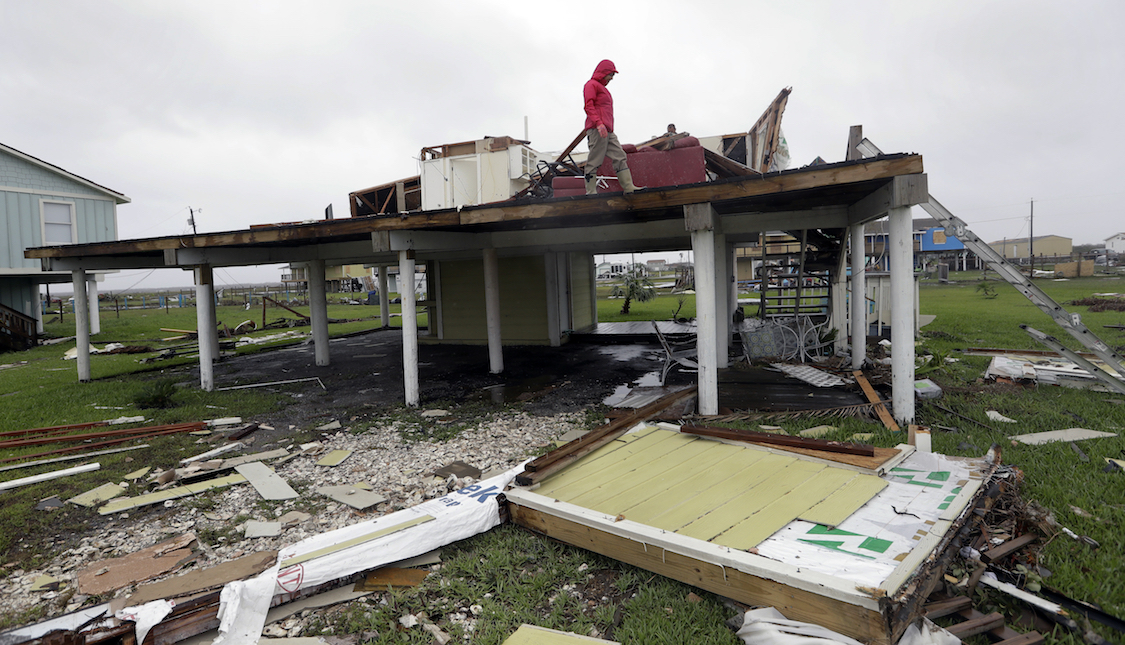 Evelyn Perkins inspects her home which was destroyed in the wake of Hurricane Harvey, Monday, Aug. 28, 2017, in Rockport, Texas. CREDIT: AP/Eric Gay