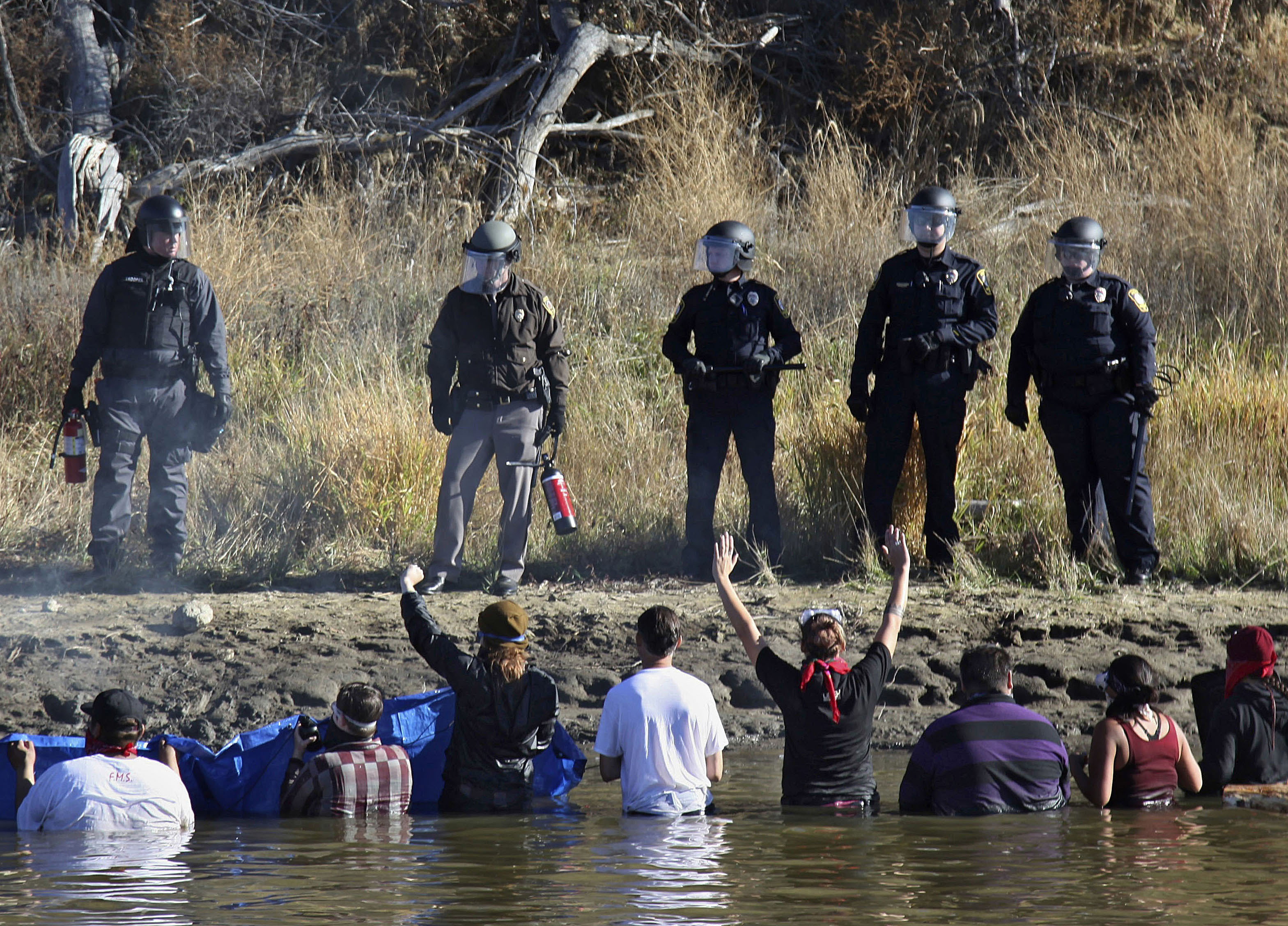 Non-violent resistance tactics used to stymie pipeline construction at Standing Rock last year could be in new legal jeopardy if lawmakers get their way. CREDIT:
AP Photo/John L. Mone