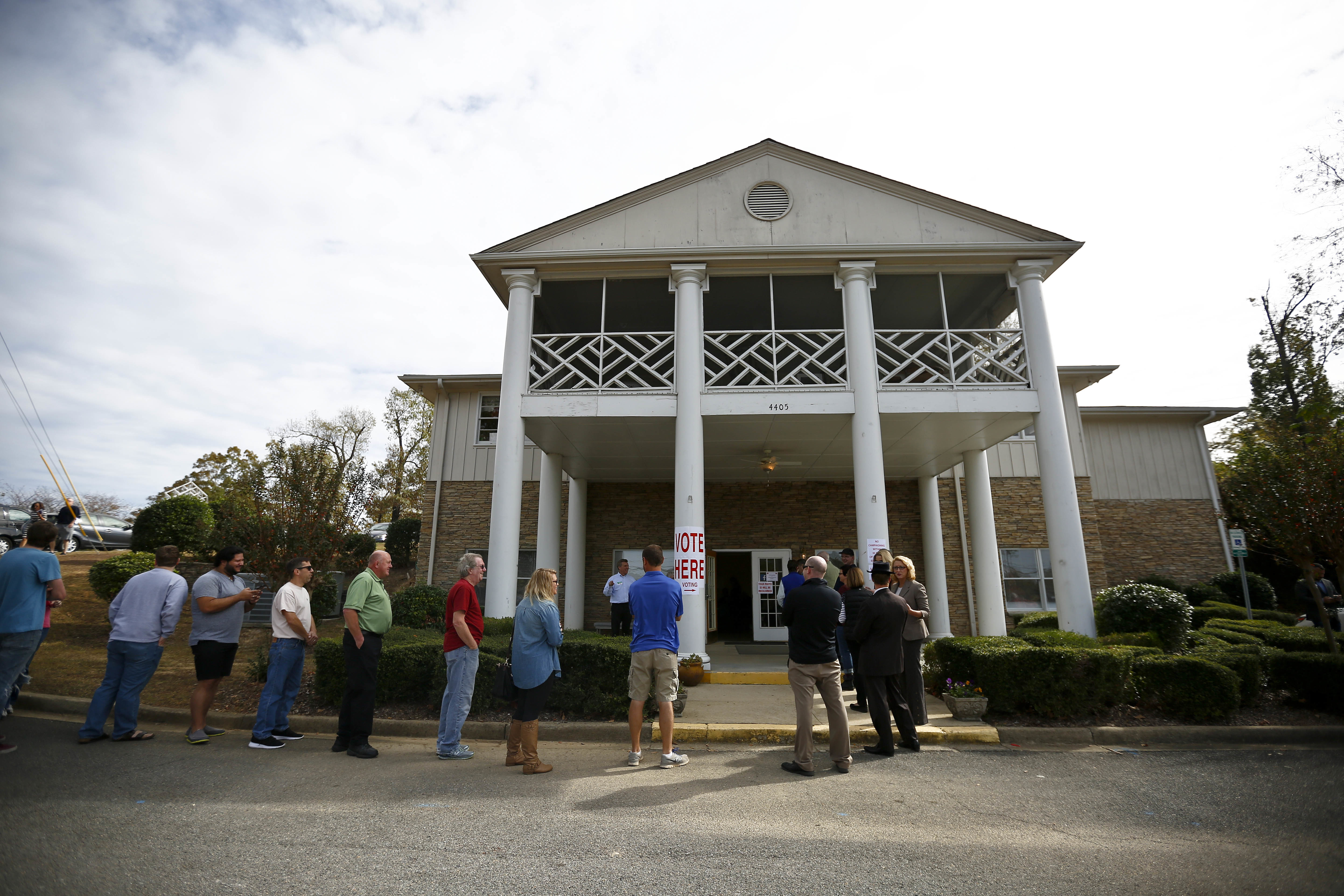 Voters wait in line to cast their ballots at a polling site, Tuesday, Nov. 8, 2016, in Birmingham, Ala. CREDIT: AP Photo/Brynn Anderson