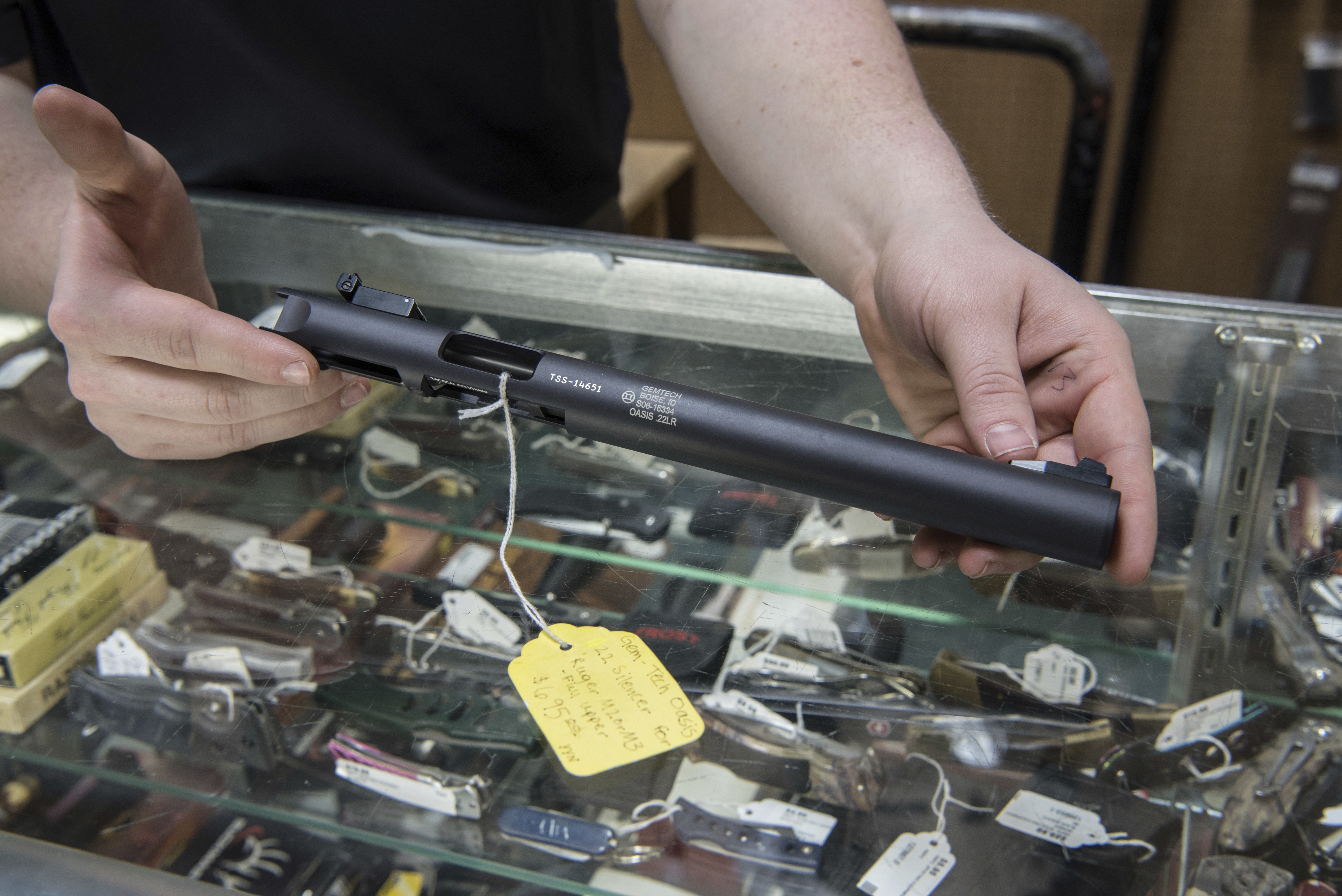 A silencer is displayed at Ed's Public Safety gun shop in Stockbridge, Ga. CREDIT: AP Photo/Lisa Marie Pane