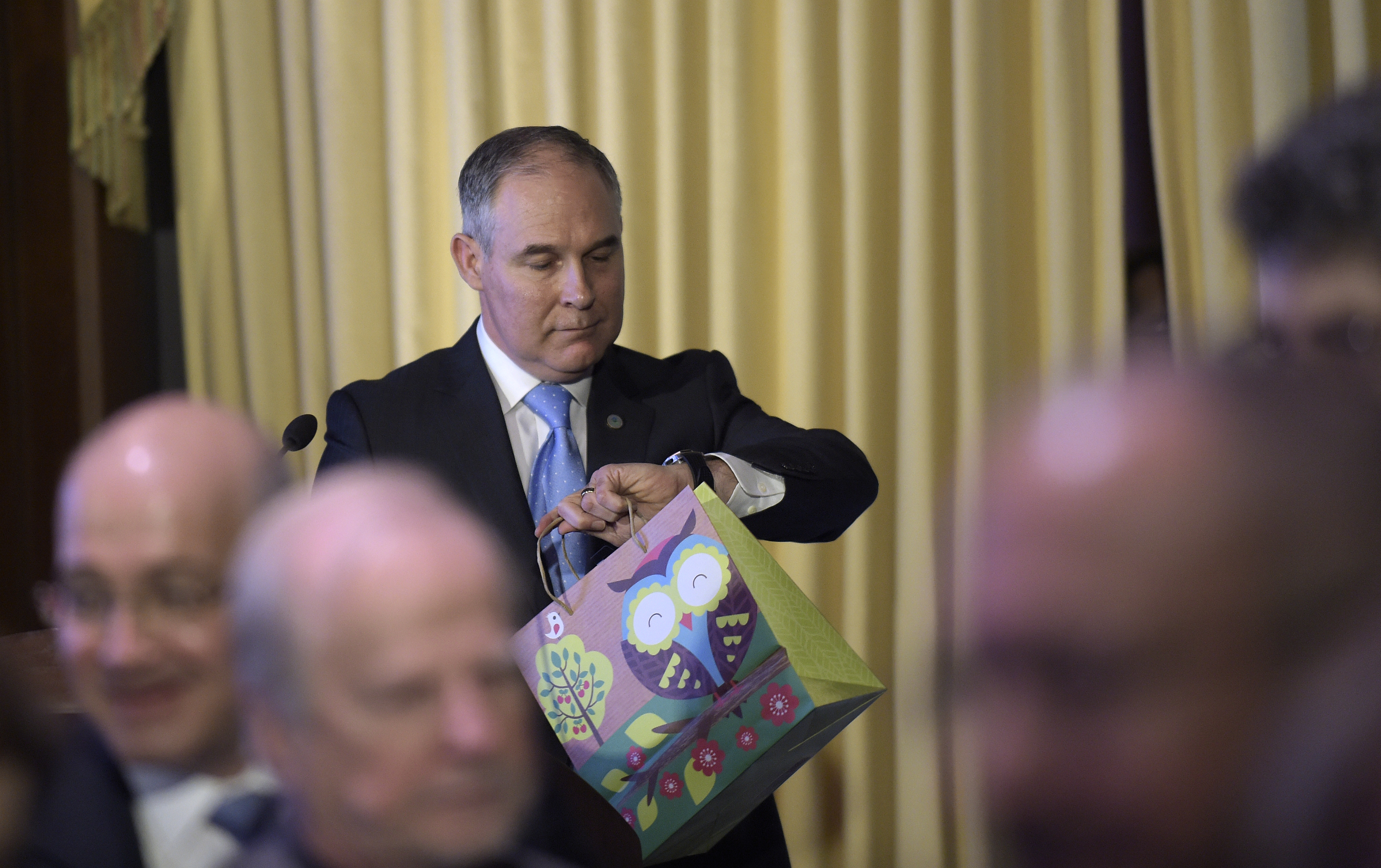 EPA Administrator Scott Pruitt looks at his watch after speaking to employees of the EPA. (CREDIT: AP Photo/Susan Walsh)